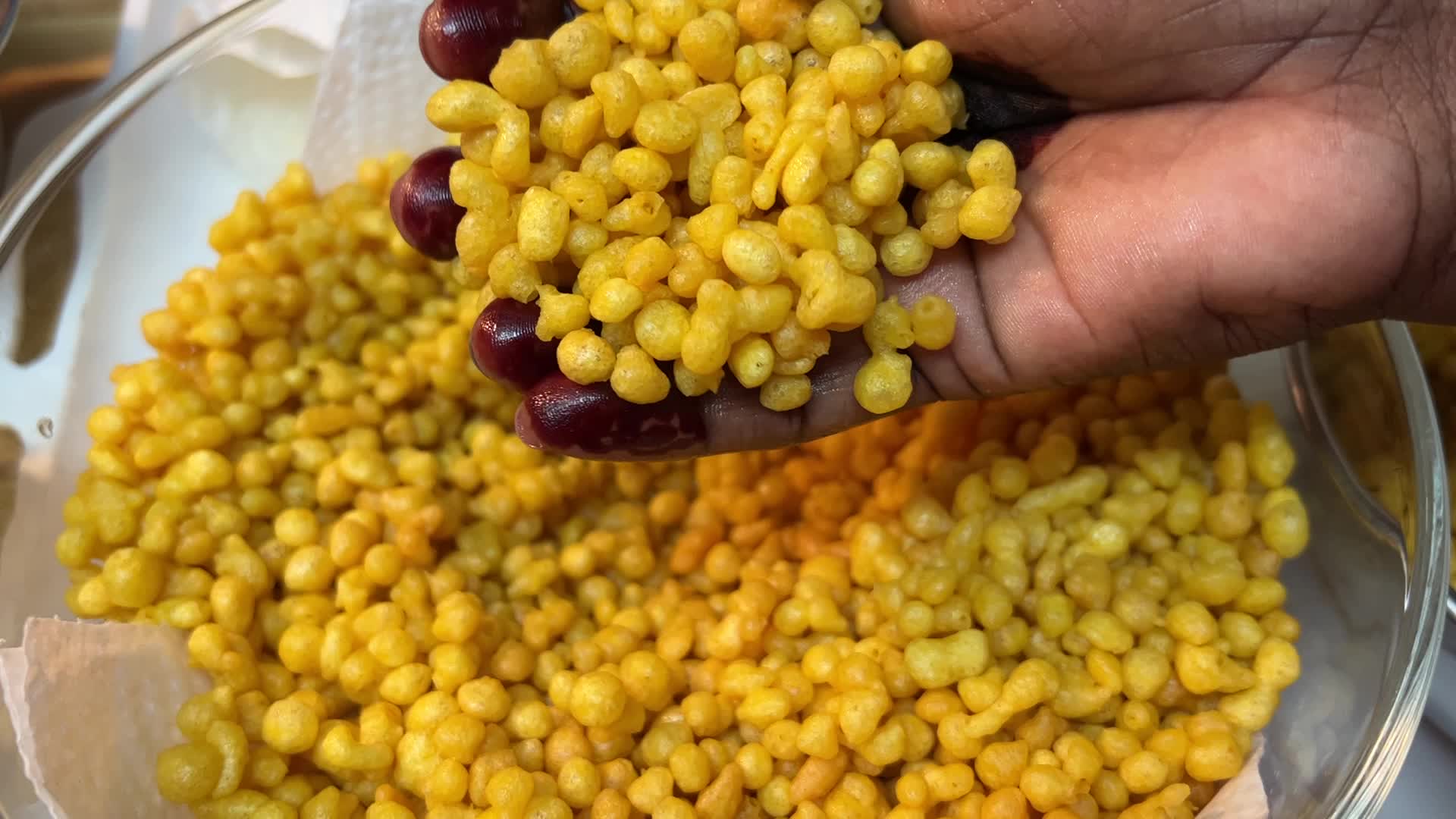 Woman preparing Boondi Laddus for the festival of Diwali
