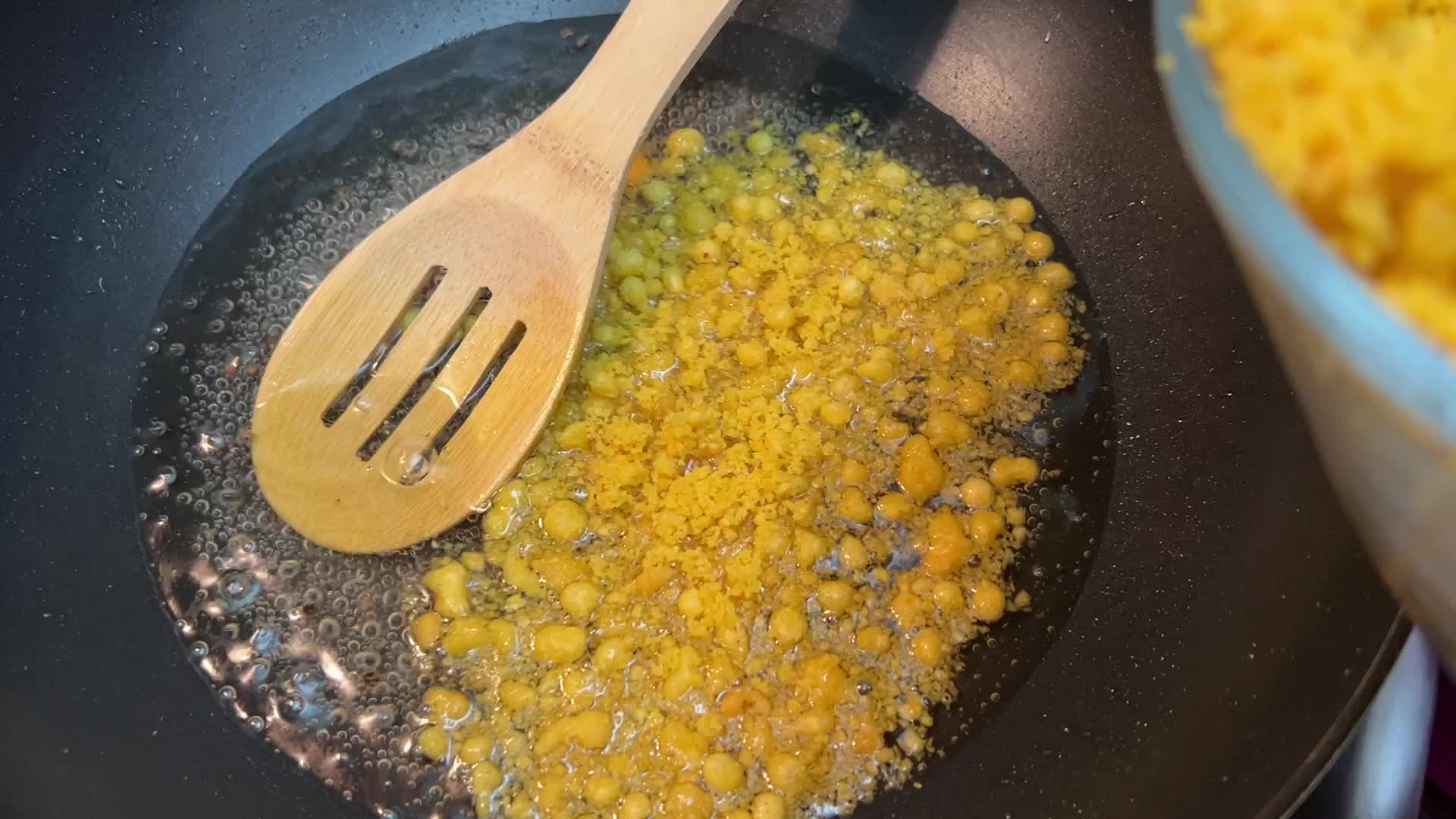 Woman preparing Boondi Laddus for the festival of Diwali