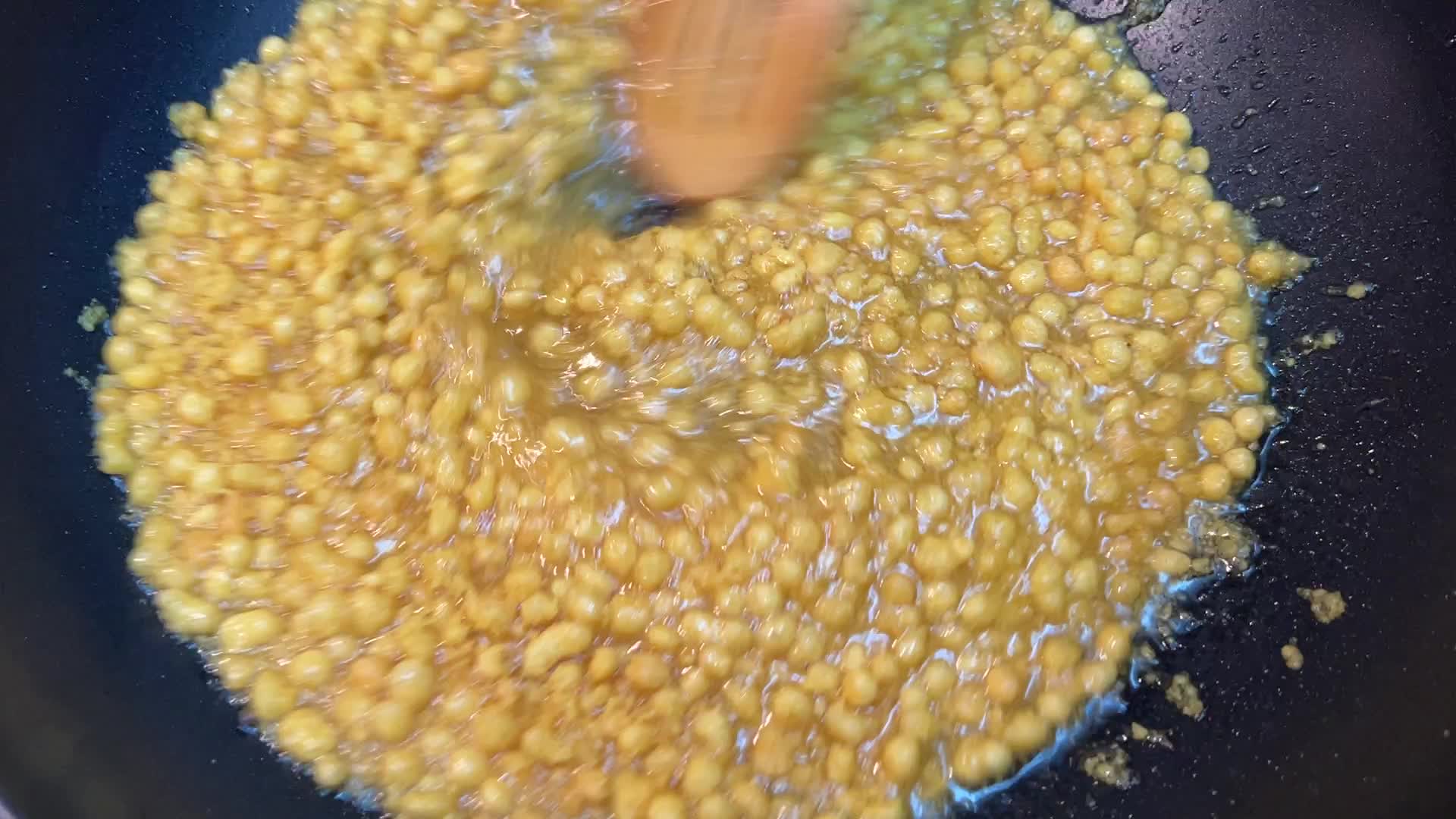 Woman preparing Boondi Laddus for the festival of Diwali