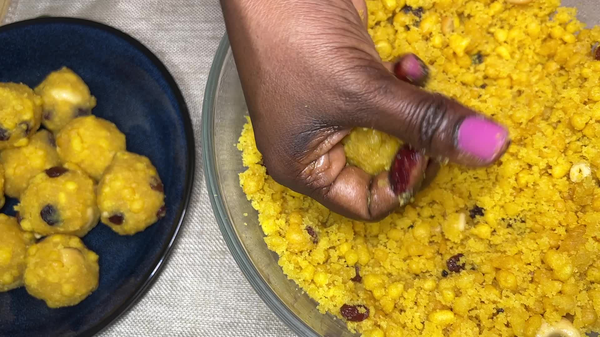Woman preparing Boondi Laddus for the festival of Diwali