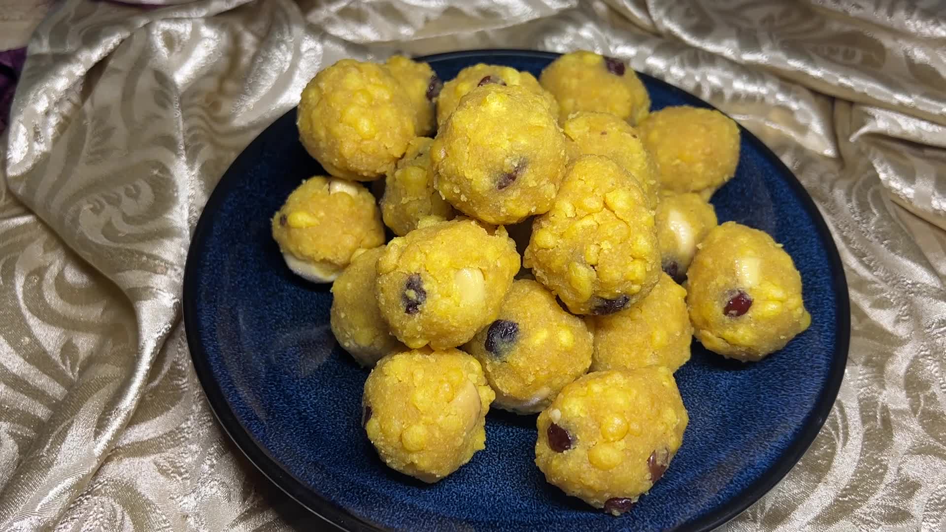 Woman preparing Boondi Laddus for the festival of Diwali
