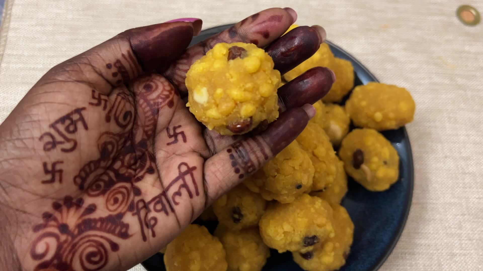Woman preparing Boondi Laddus for the festival of Diwali