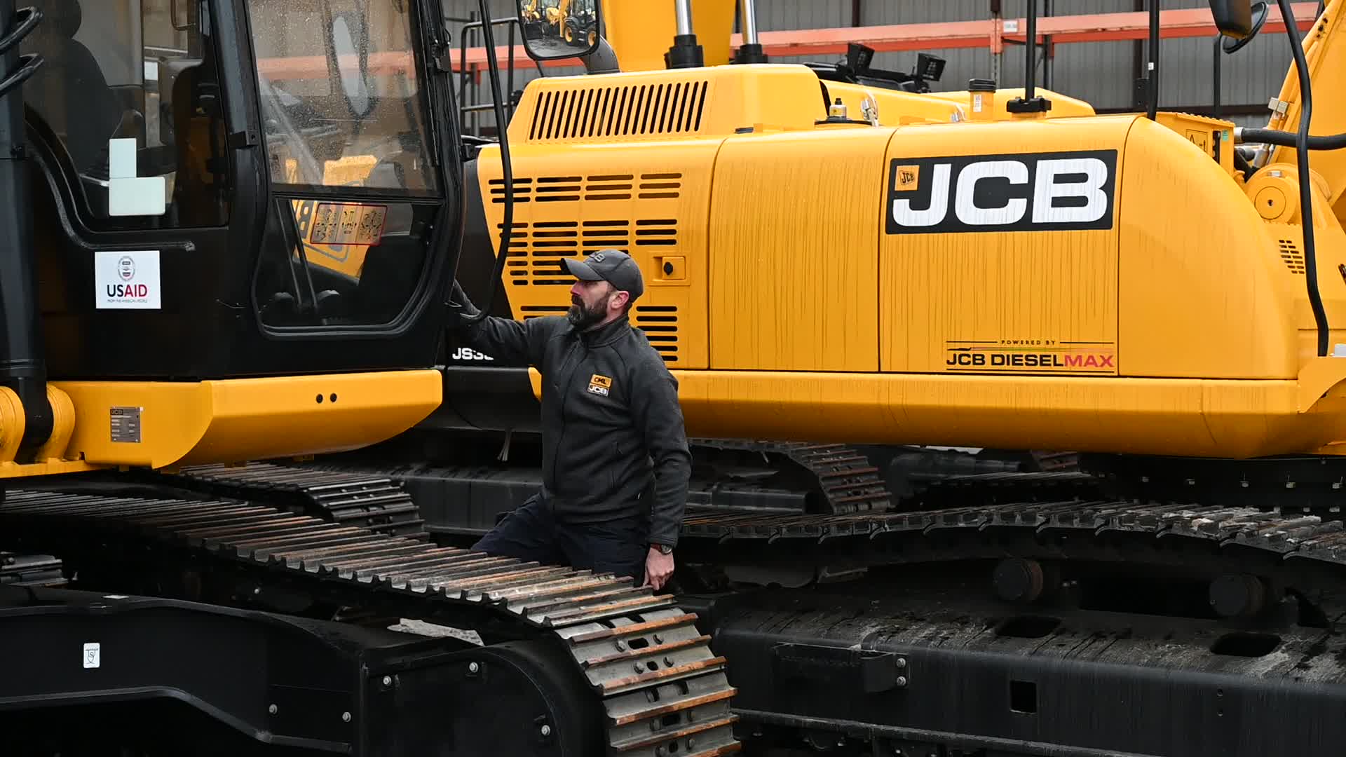 US Ambassador to Ukraine hands over heavy machinery in Kyiv, amid Russia's invasion of Ukraine