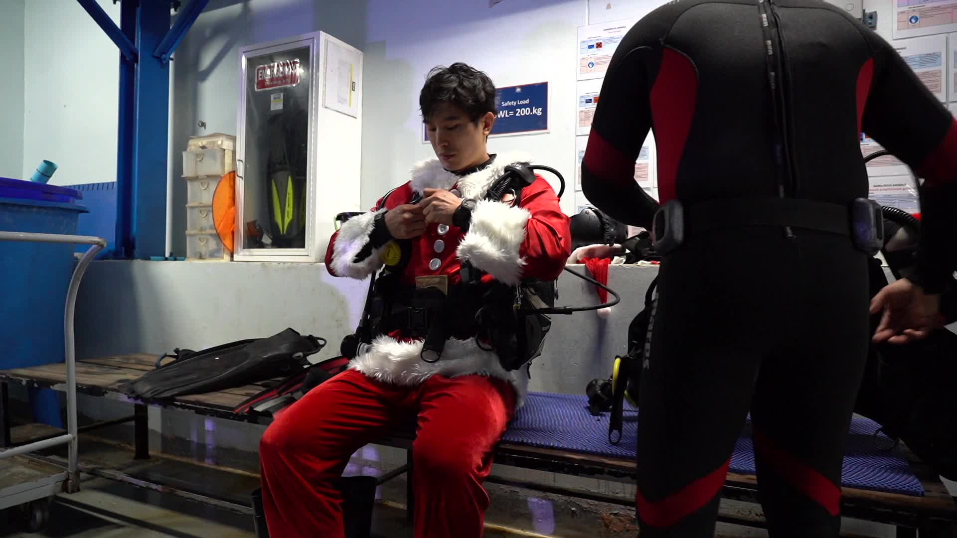 Diver Dressed As Santa Claus Feeds Fish to Celebrate Christmas, in Bangkok.
