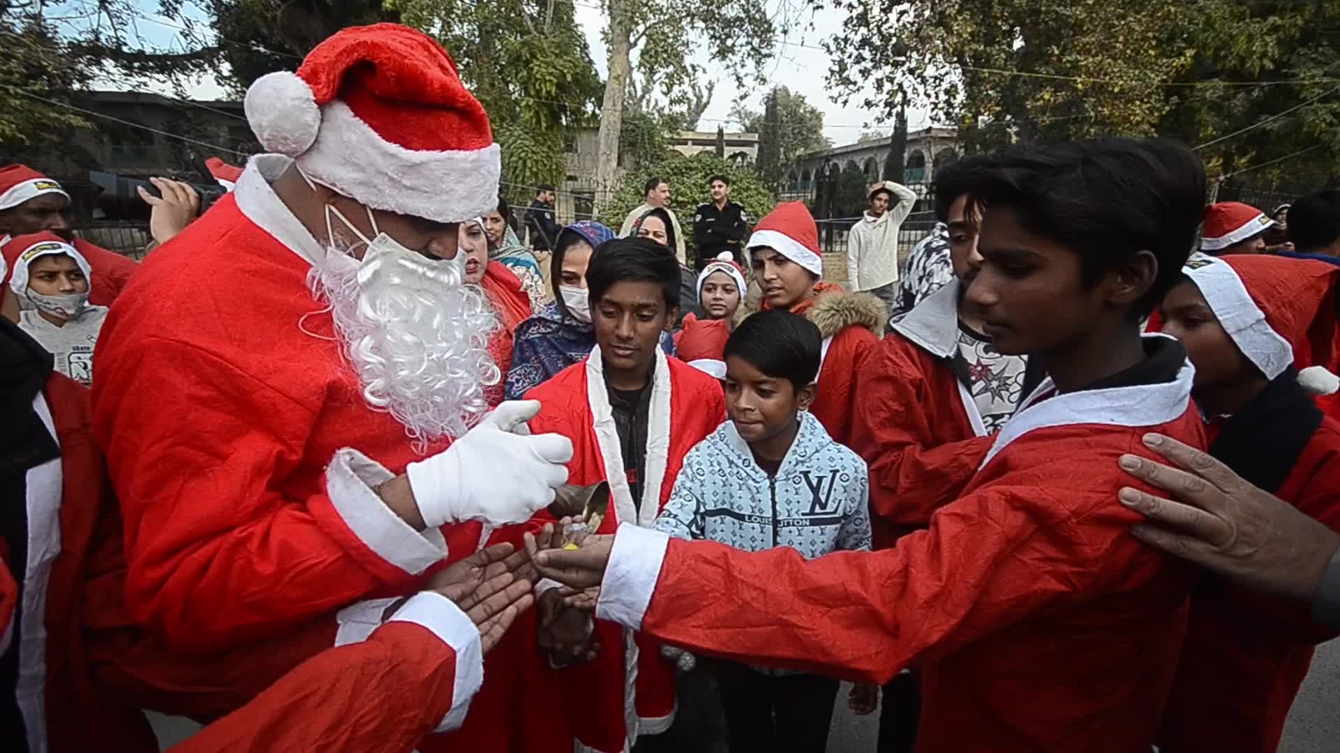 Christians Santa Claus rally ahead of Christmas in Peshawar 