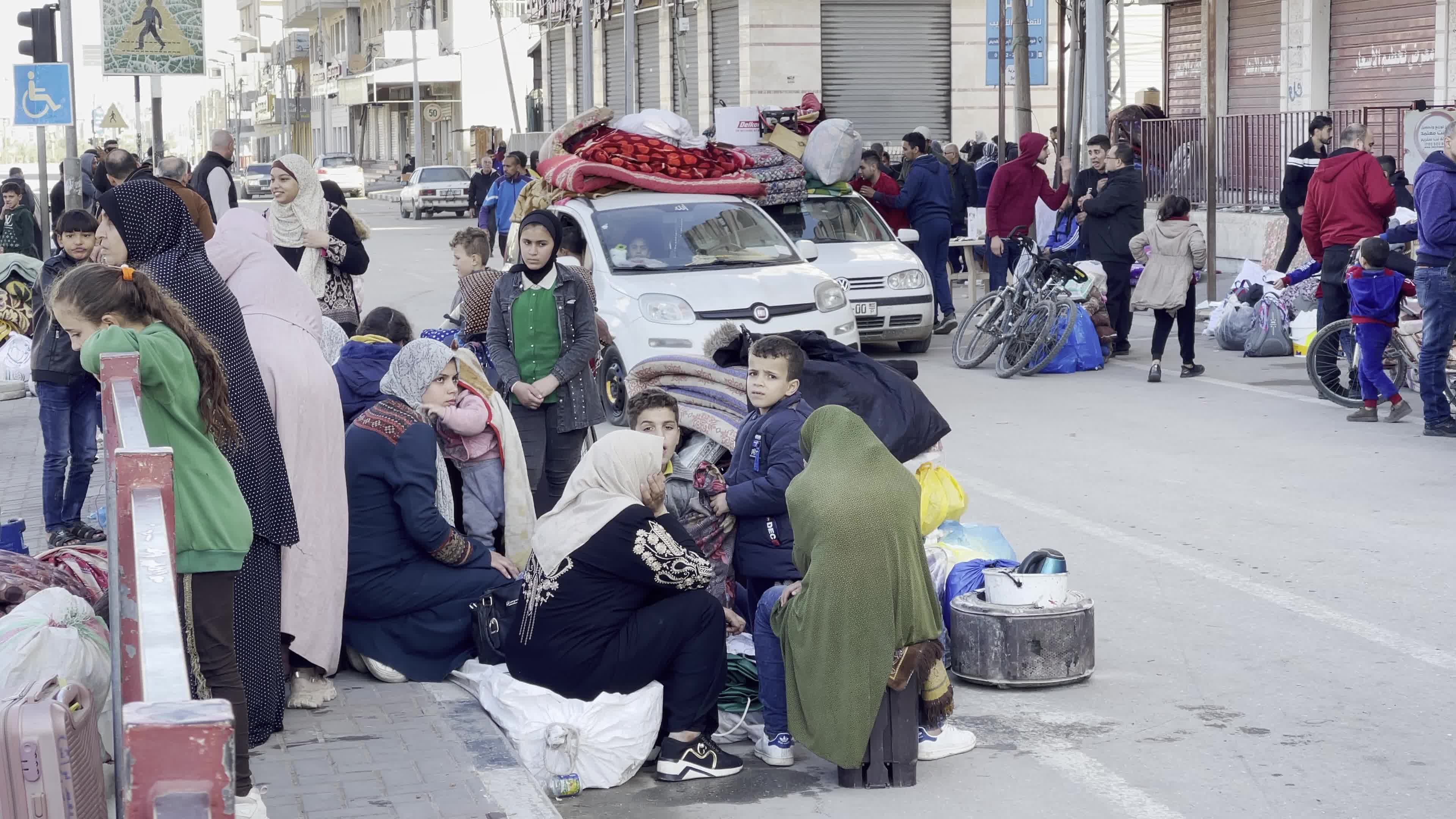 Palestinians Flee Homes Under Evacuation Orders Amid Israel-Hamas Conflict