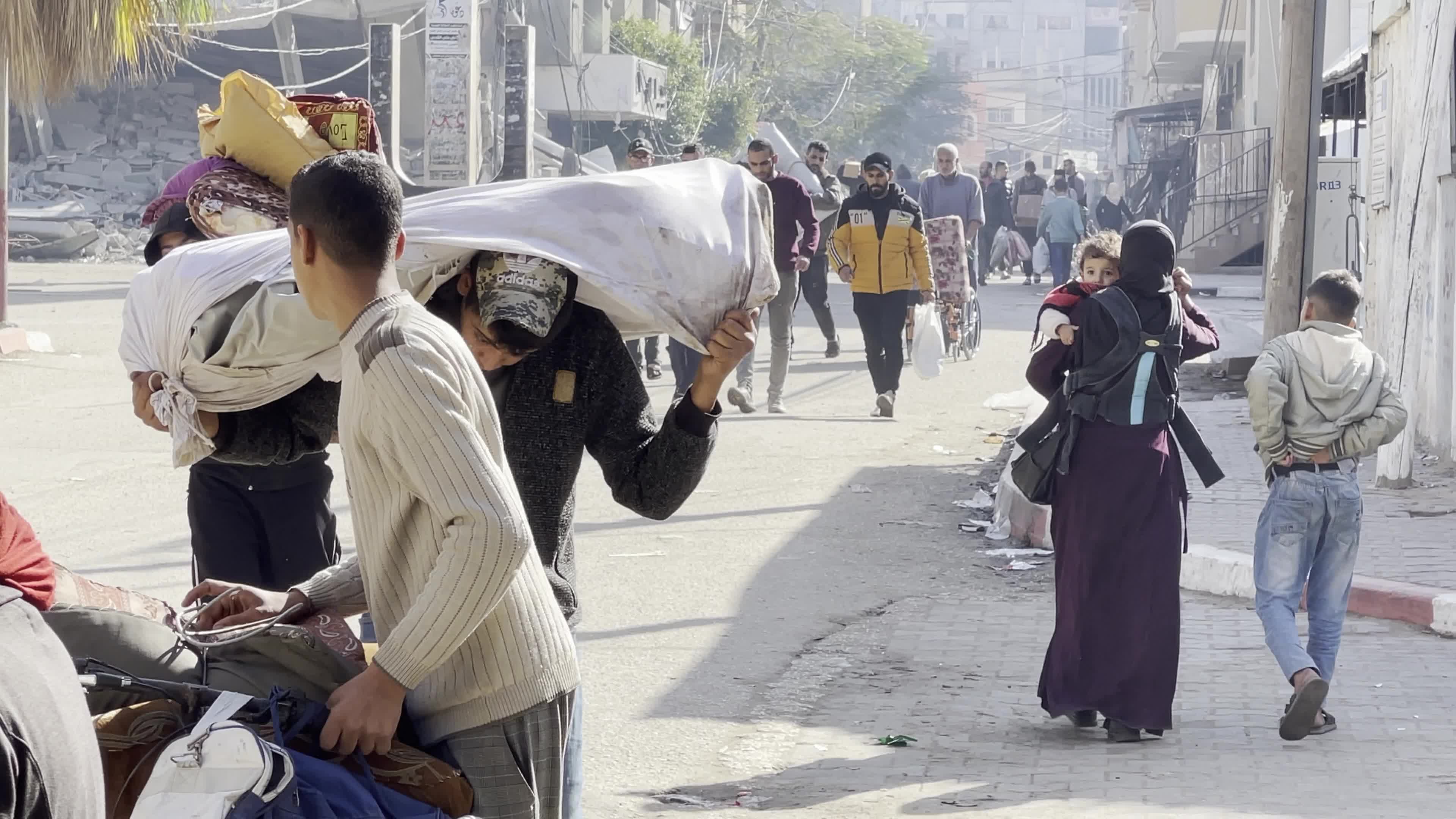 Palestinians Flee Homes Under Evacuation Orders Amid Israel-Hamas Conflict