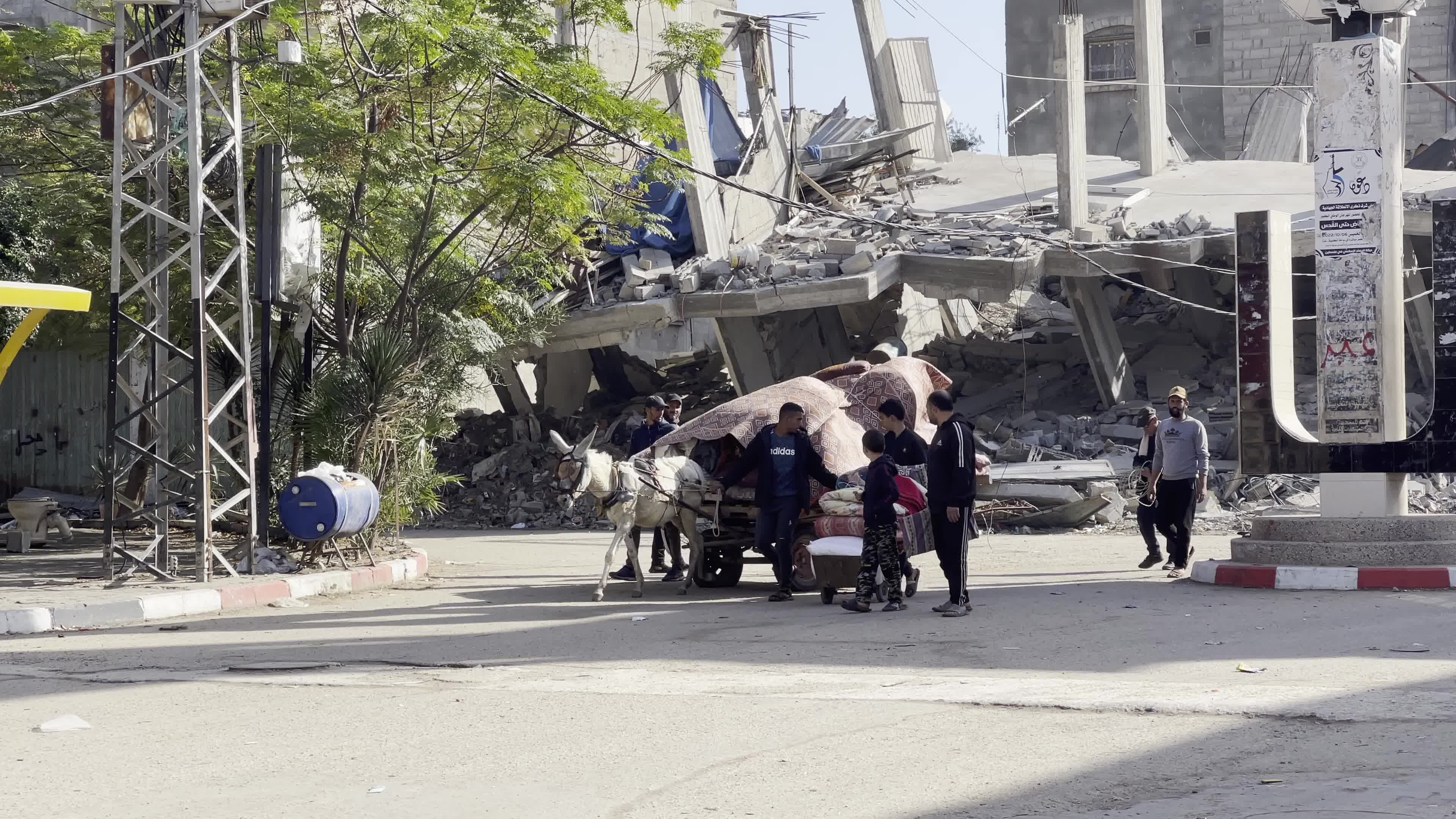 Palestinians Flee Homes Under Evacuation Orders Amid Israel-Hamas Conflict