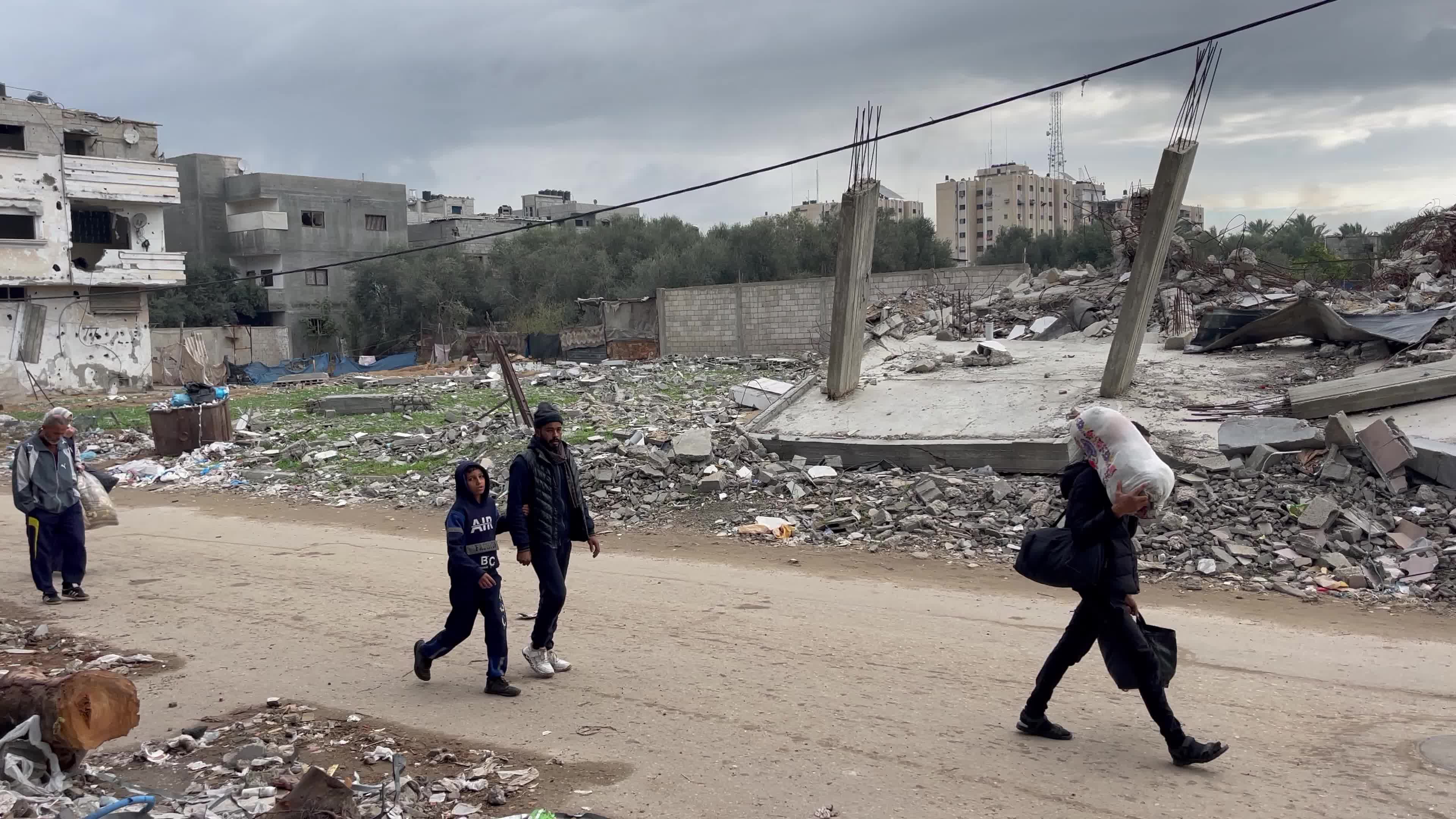 Residents Flee Nuseirat Camp Carrying Belongings Amidst Israel-Hamas Conflict - January 3, 2024
