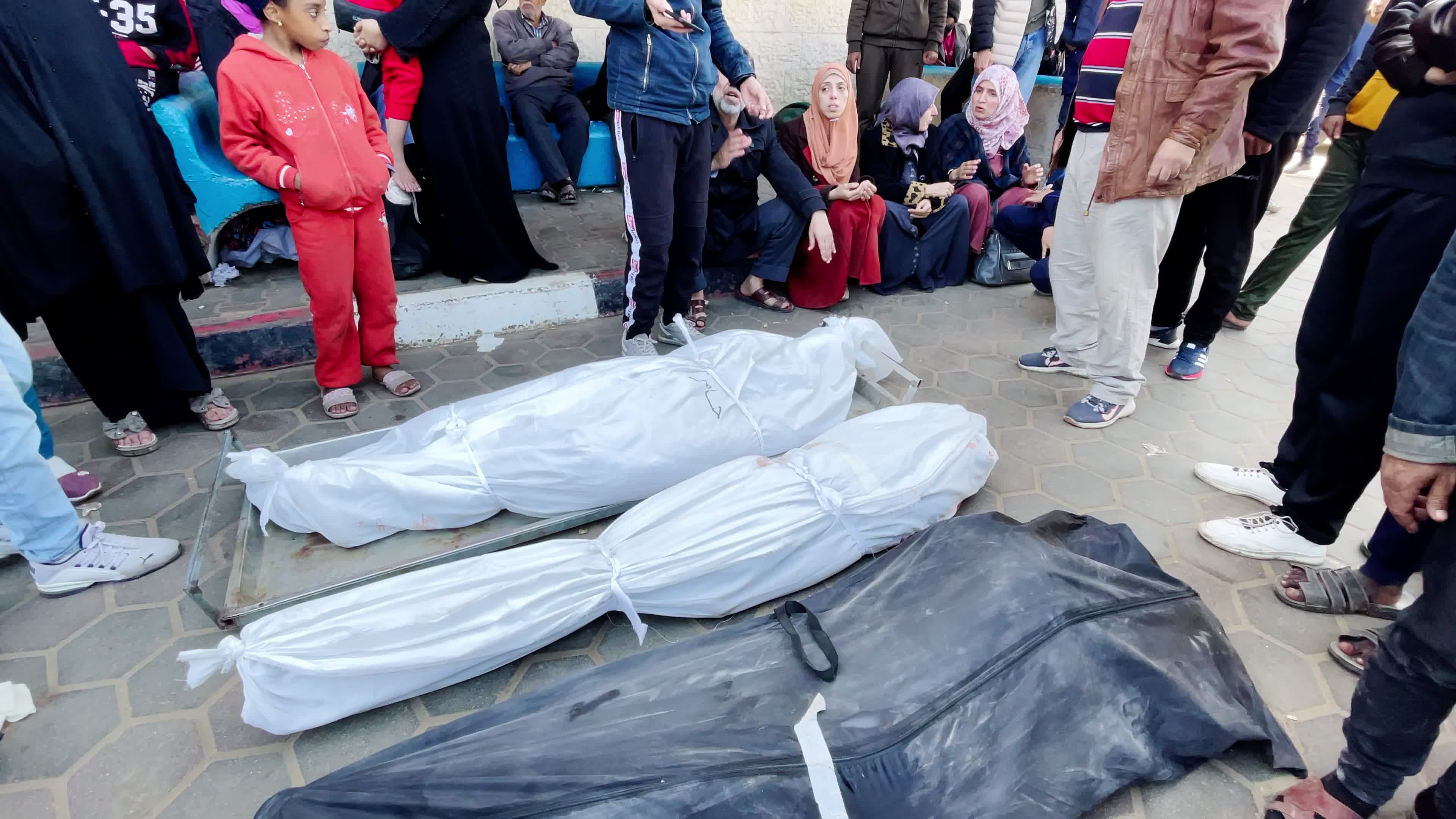 Palestinian Mourners Gather at Al-Aqsa Hospital Following Israeli Airstrike
