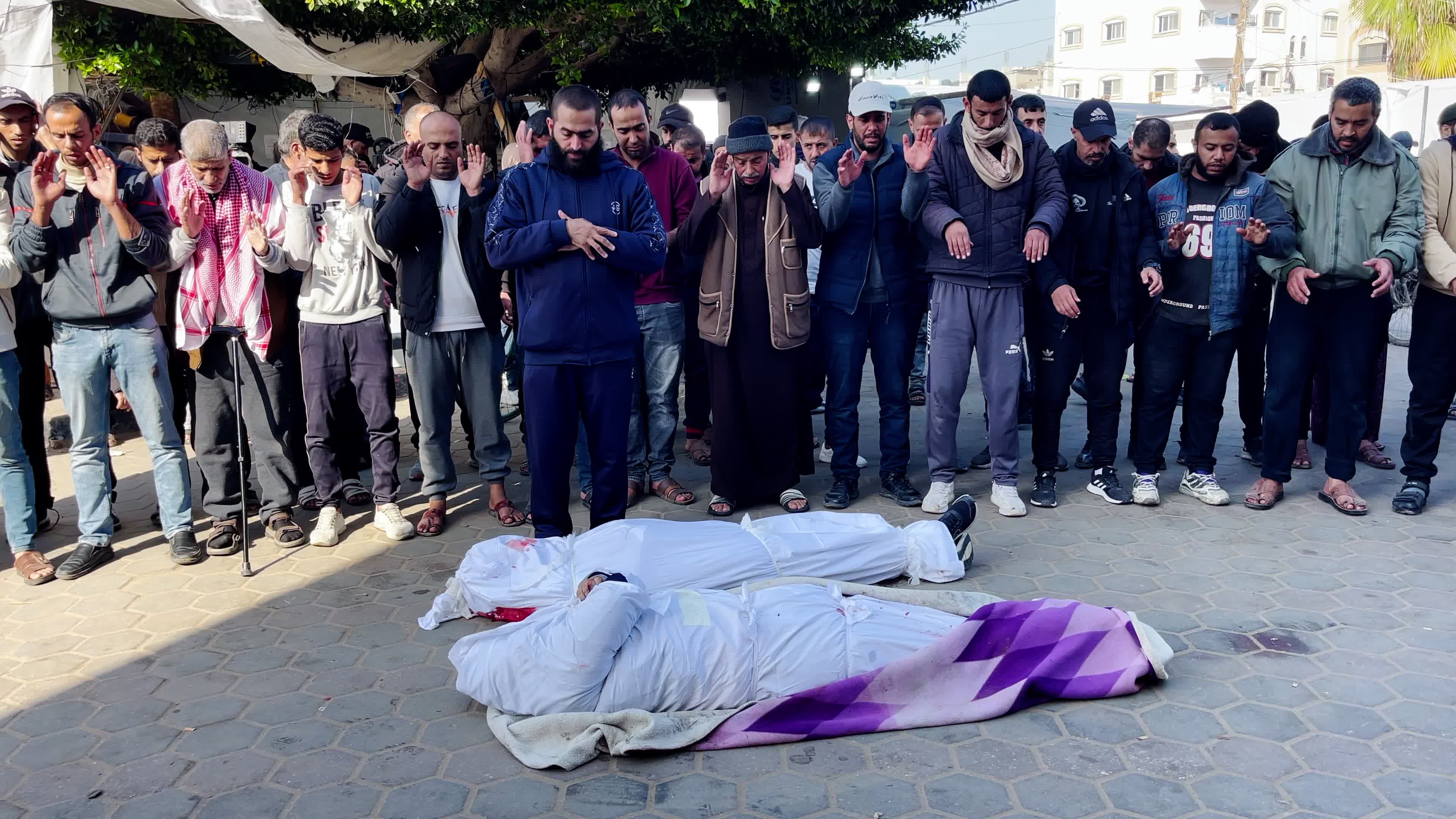 Palestinian Mourners Gather at Al-Aqsa Hospital Following Israeli Airstrike