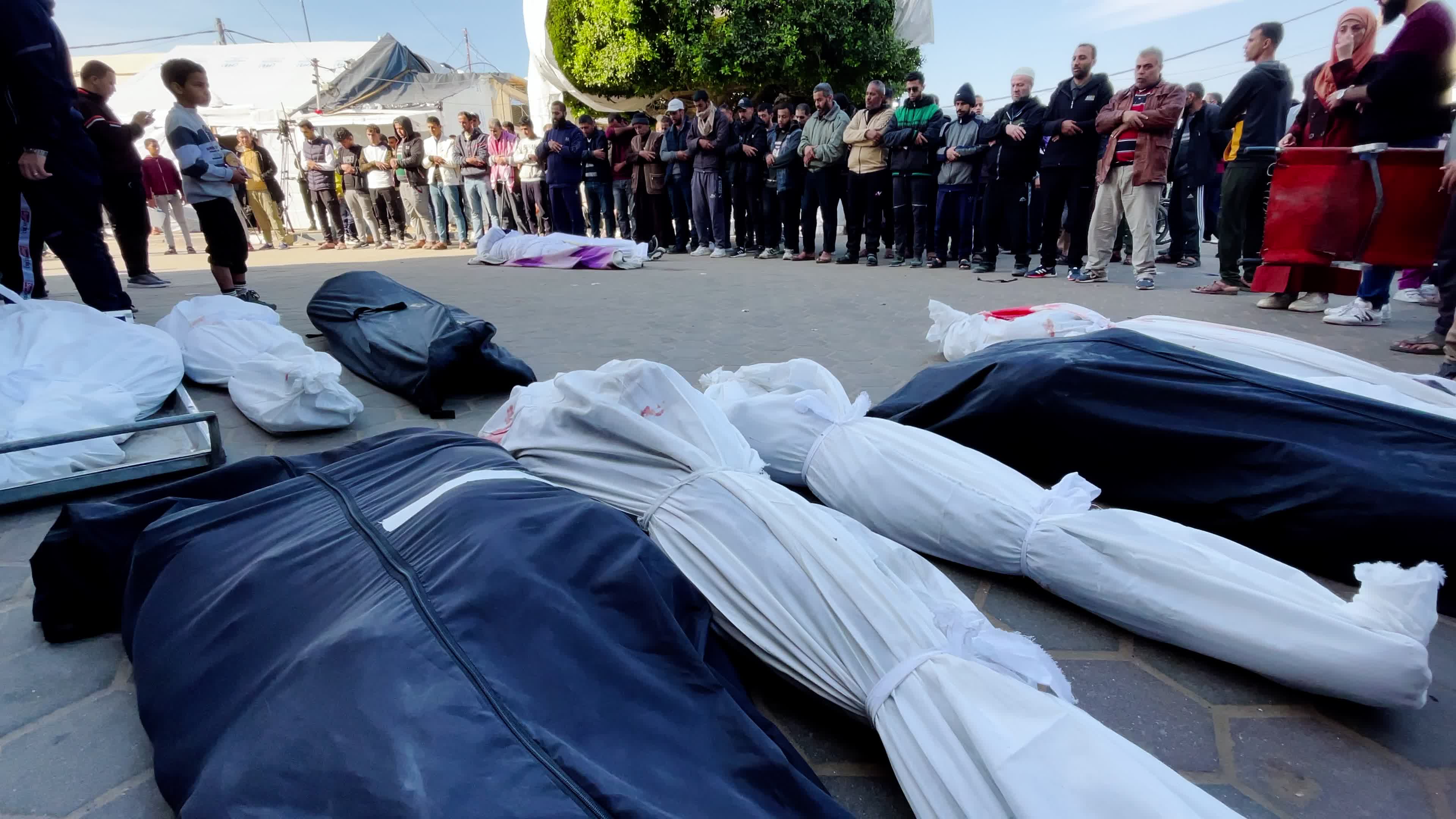 Palestinian Mourners Gather at Al-Aqsa Hospital Following Israeli Airstrike
