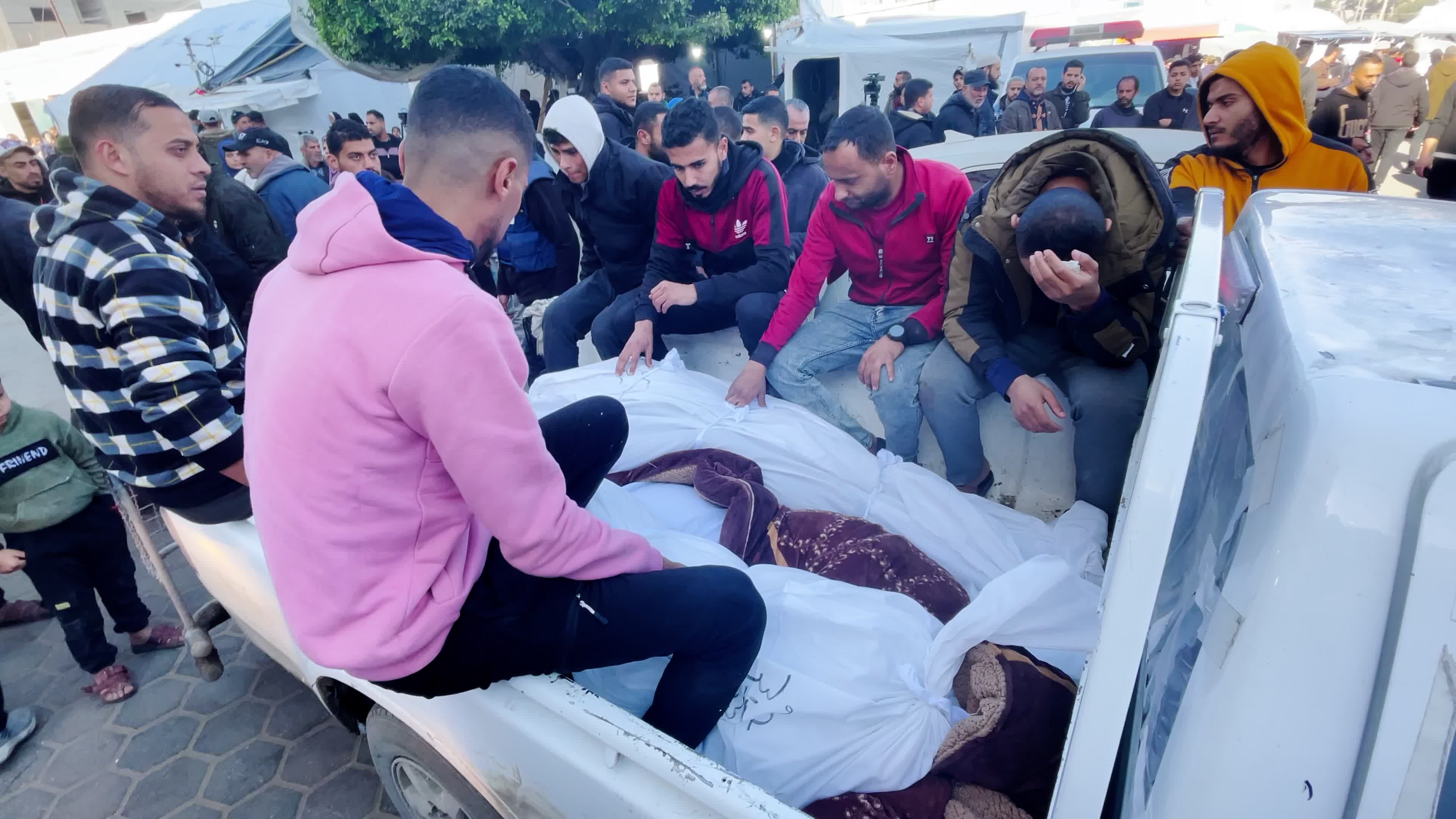 Palestinian Mourners Gather at Al-Aqsa Hospital Following Israeli Airstrike