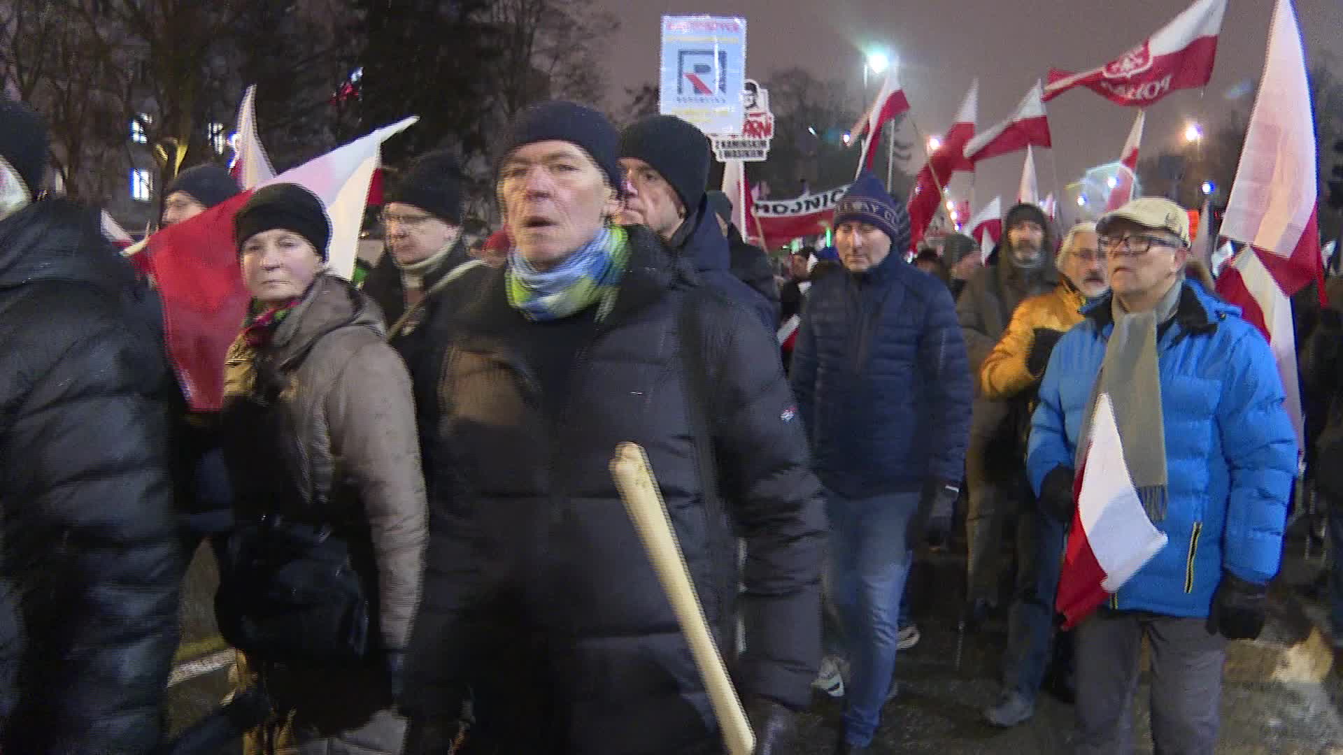 Mass protest outside parliament building in Warsaw amid Poland's change of power