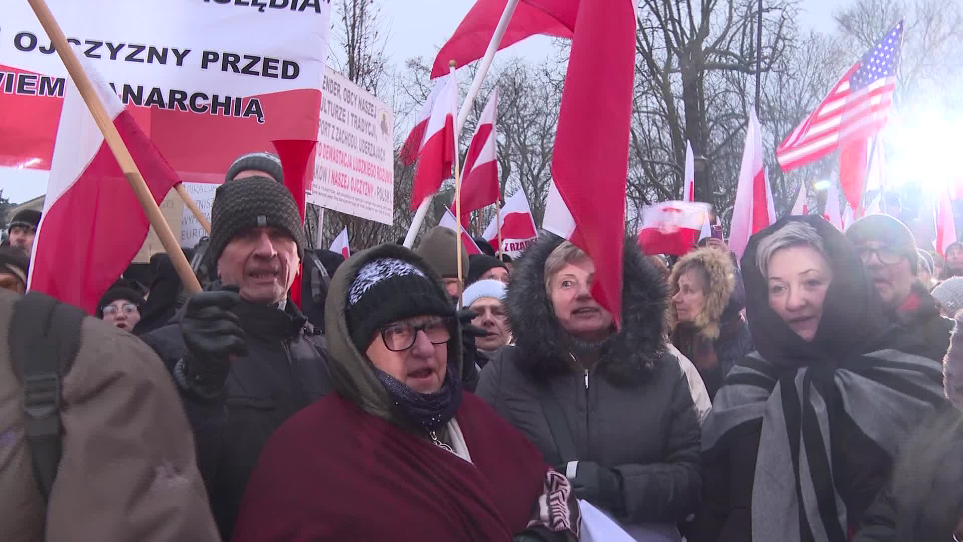 Mass protest outside parliament building in Warsaw amid Poland's change of power