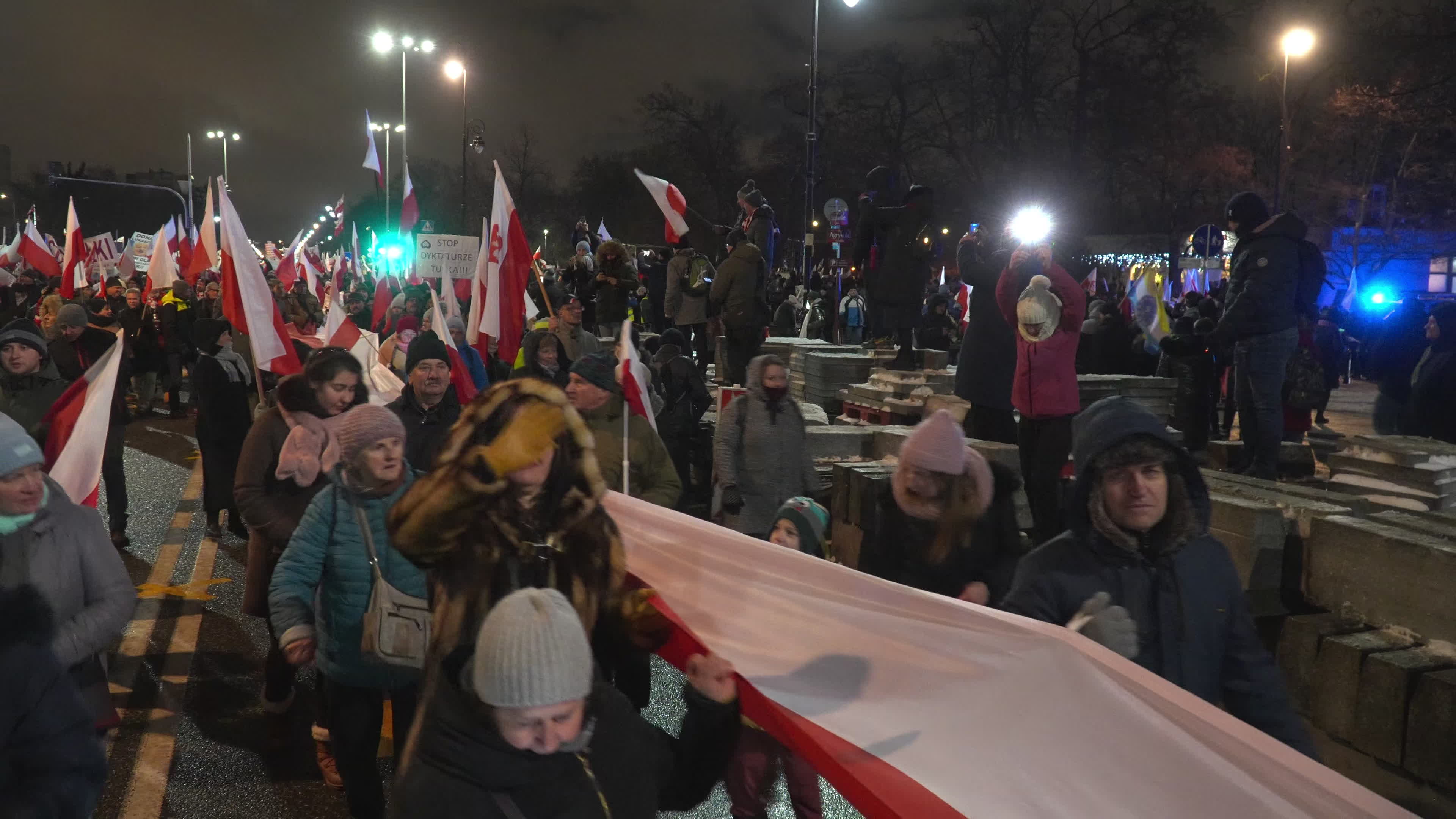 Tens of thousands march in protest of imprisoned politicians in Warsaw