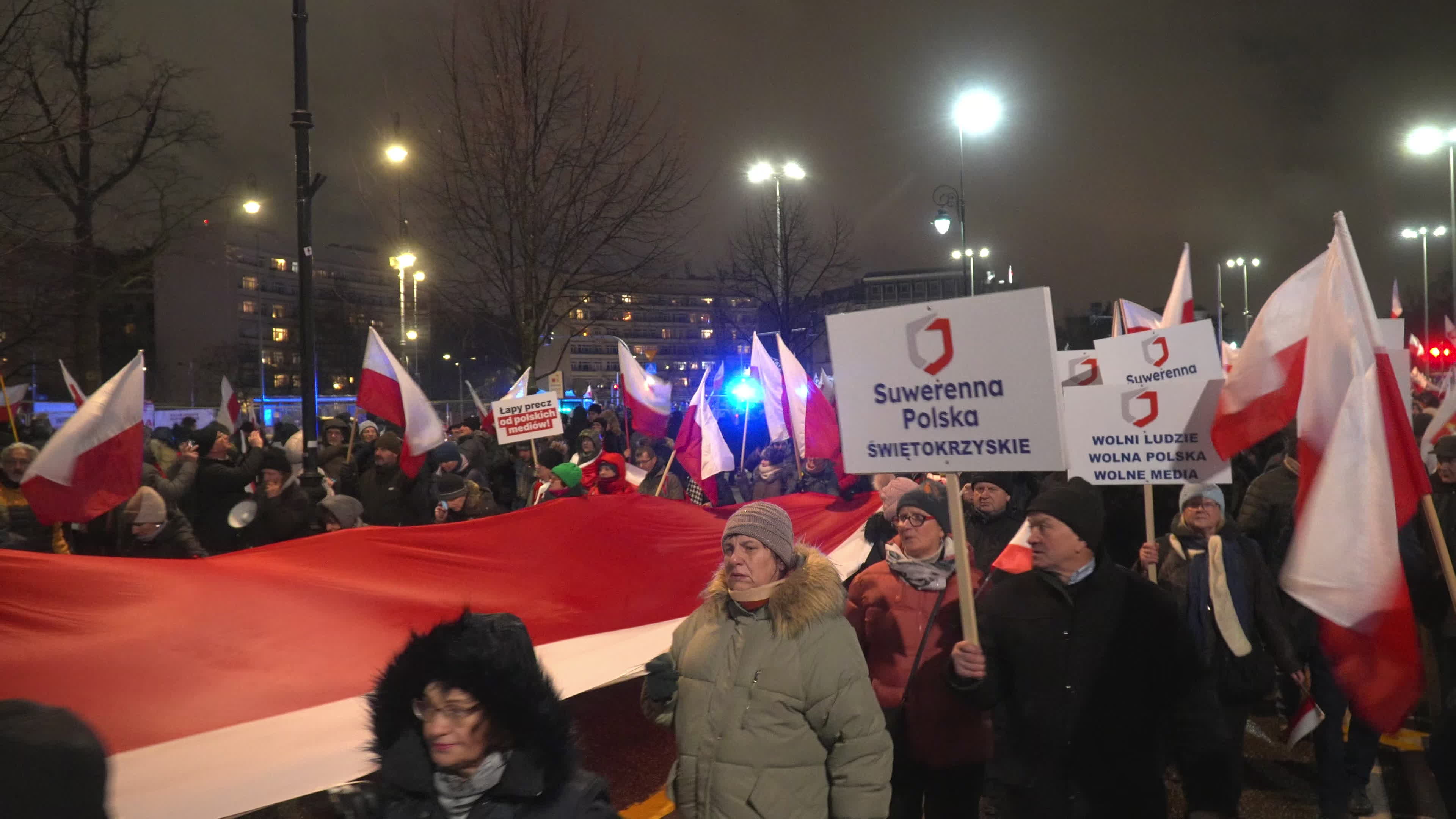 Tens of thousands march in protest of imprisoned politicians in Warsaw