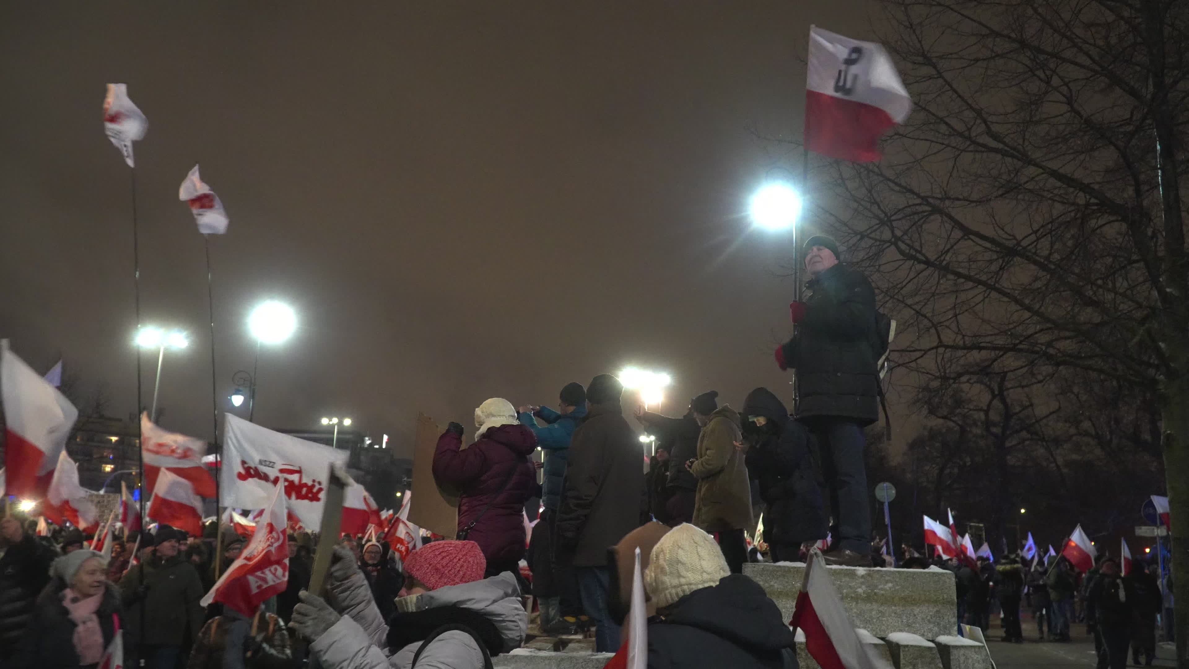Tens of thousands march in protest of imprisoned politicians in Warsaw