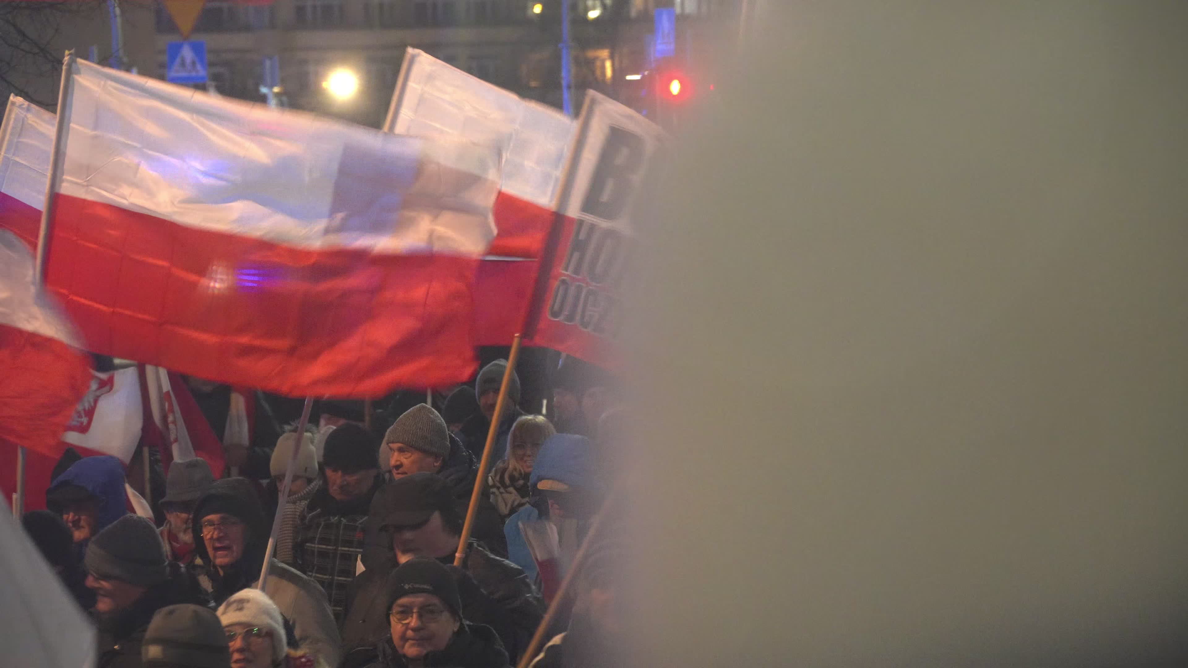 Tens of thousands march in protest of imprisoned politicians in Warsaw