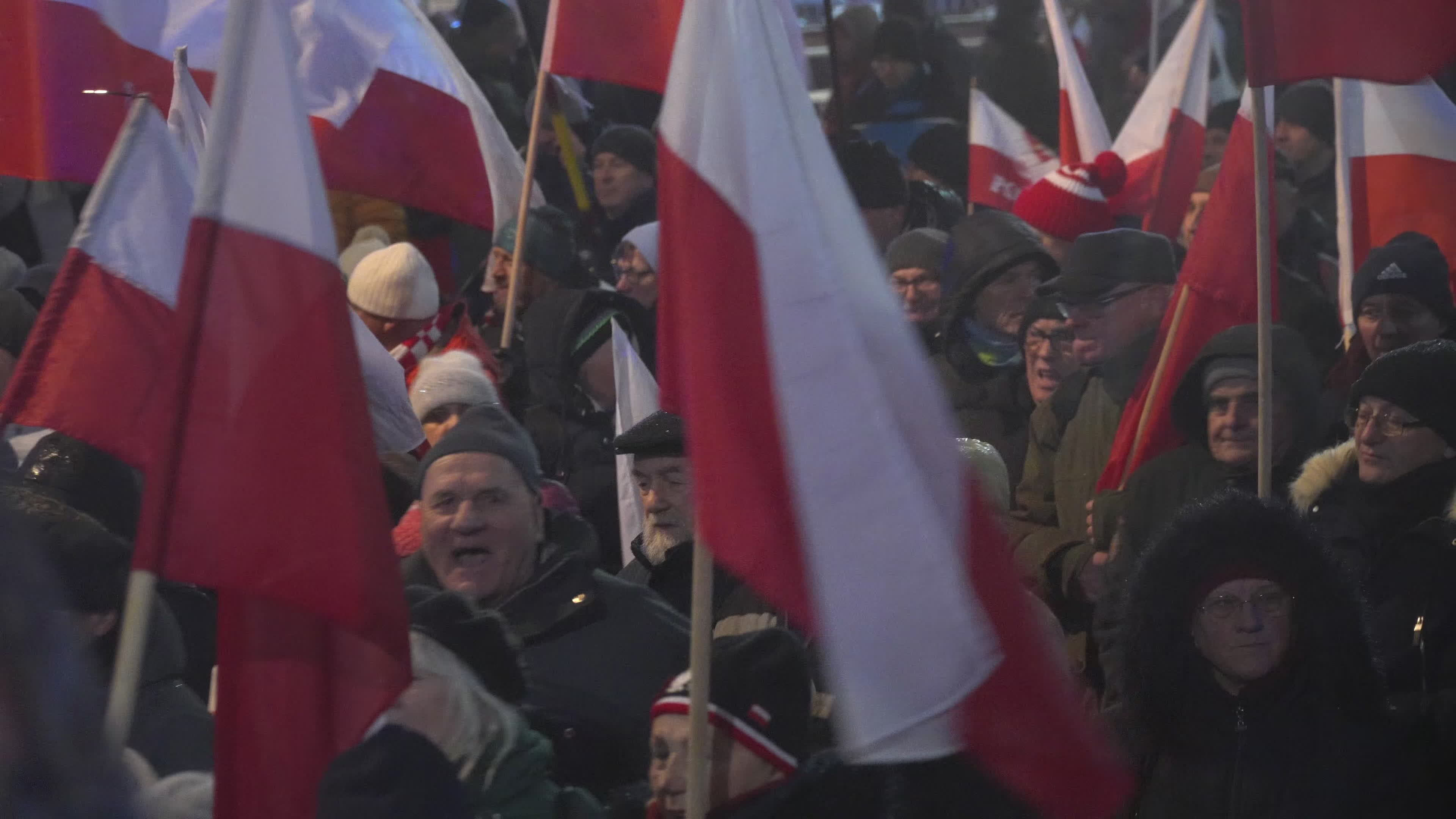 Tens of thousands march in protest of imprisoned politicians in Warsaw