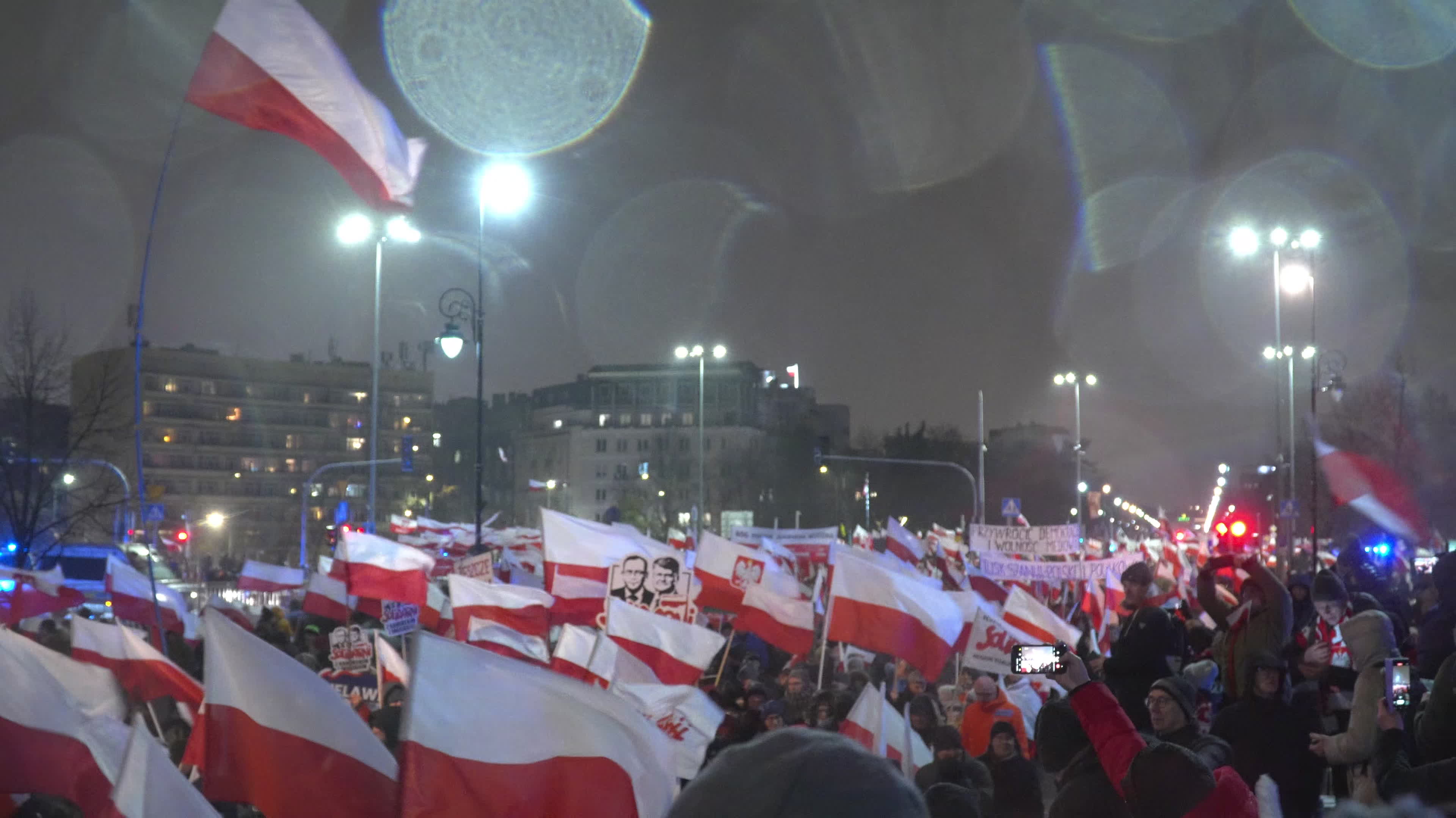 Tens of thousands march in protest of imprisoned politicians in Warsaw