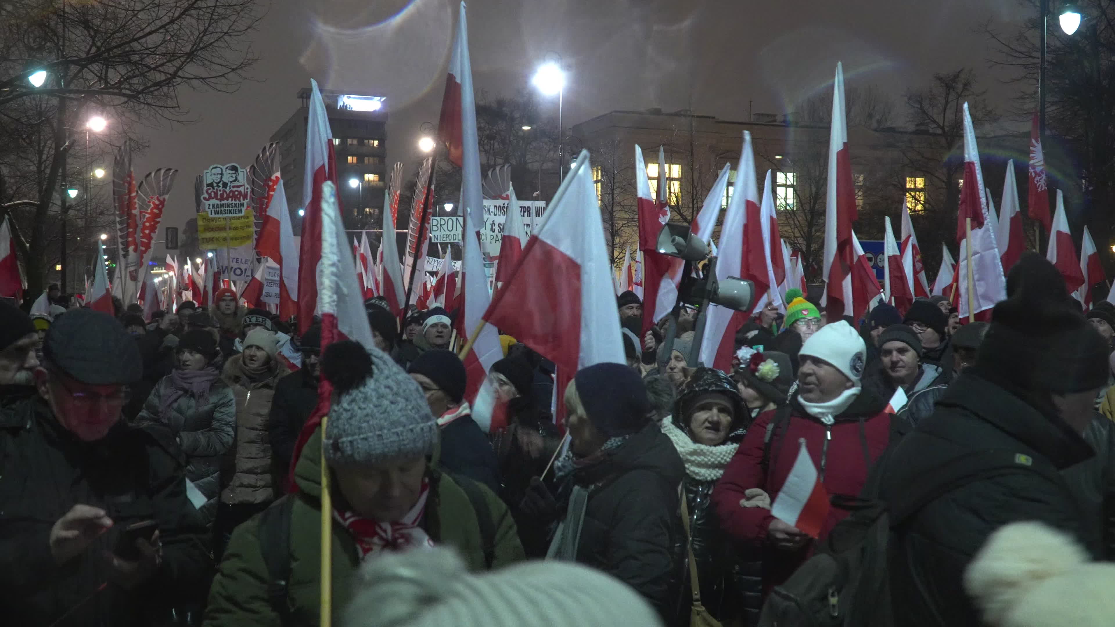 Tens of thousands march in protest of imprisoned politicians in Warsaw