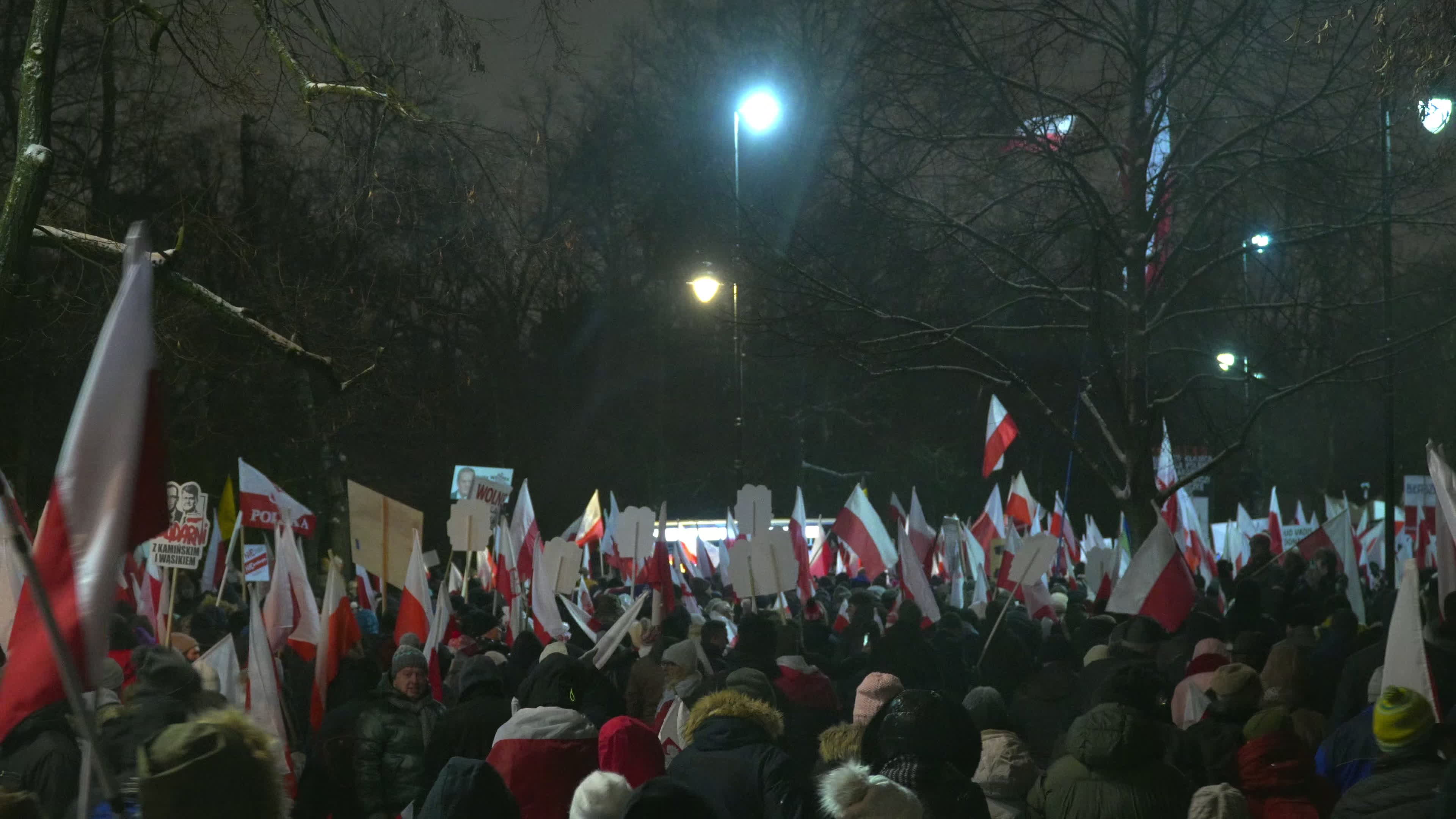 Tens of thousands march in protest of imprisoned politicians in Warsaw