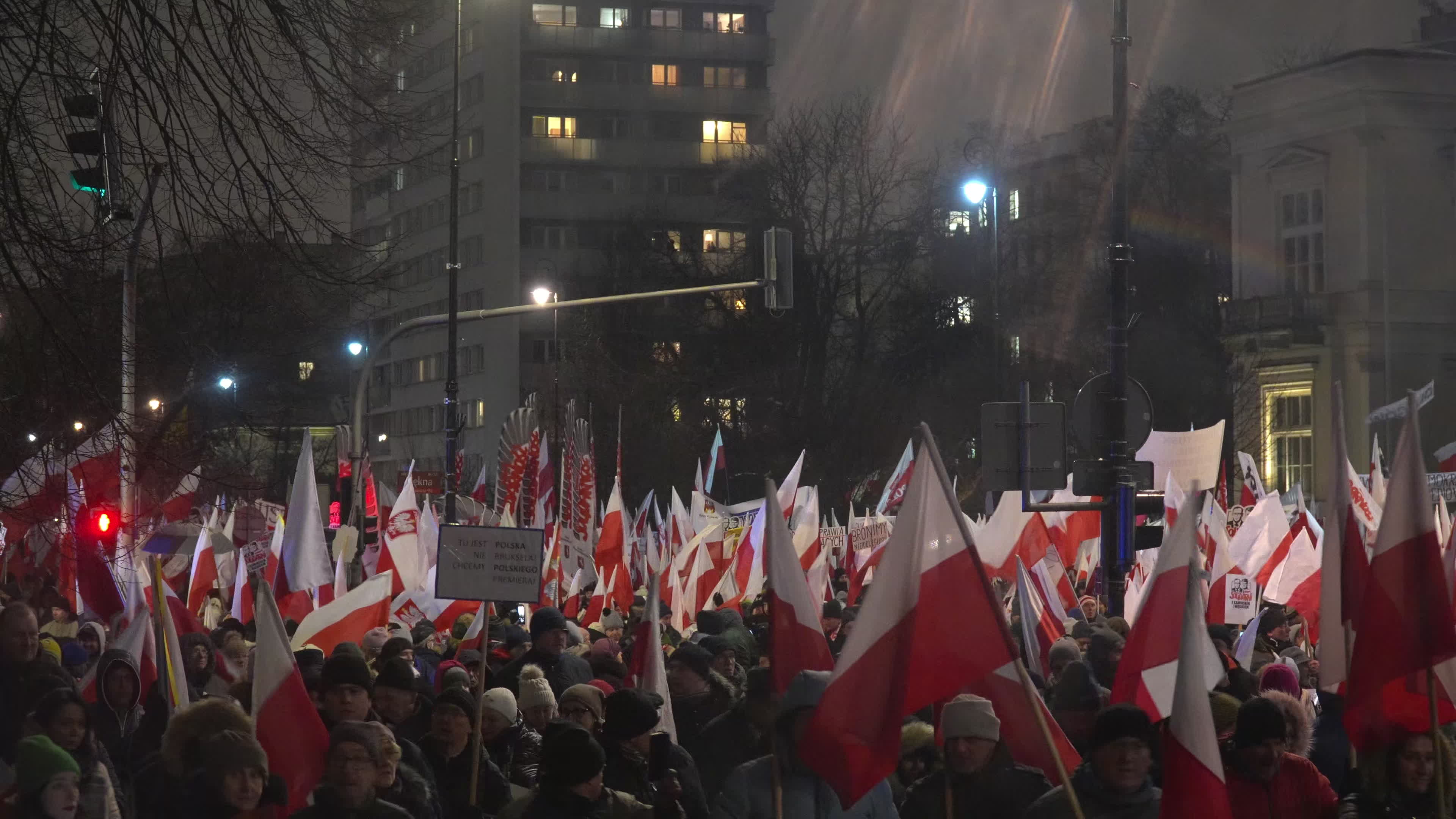 Tens of thousands march in protest of imprisoned politicians in Warsaw