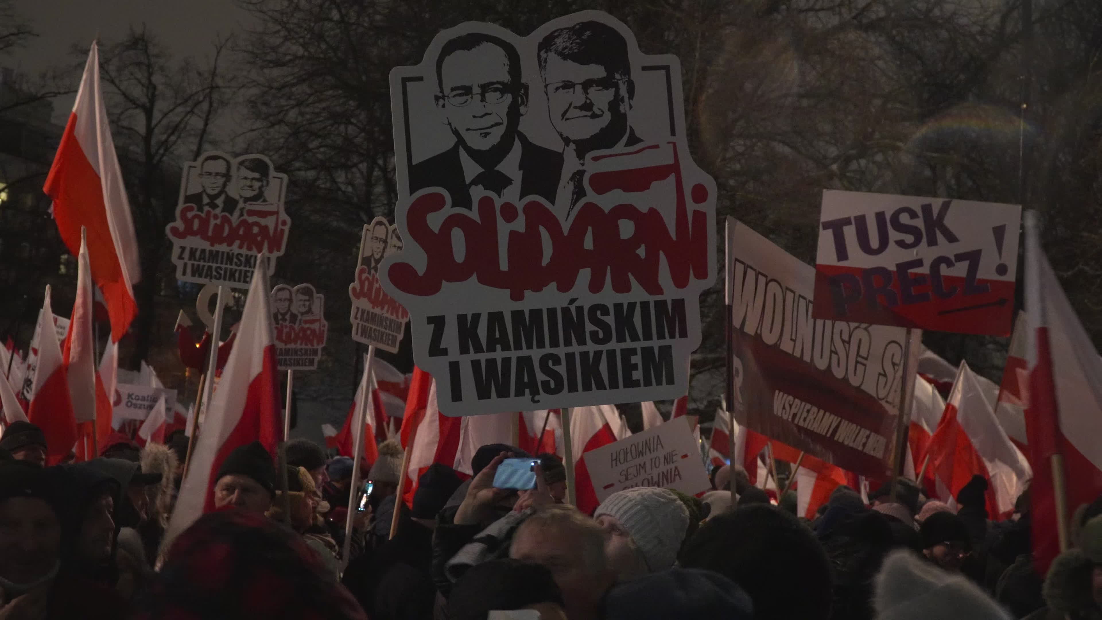 Tens of thousands march in protest of imprisoned politicians in Warsaw