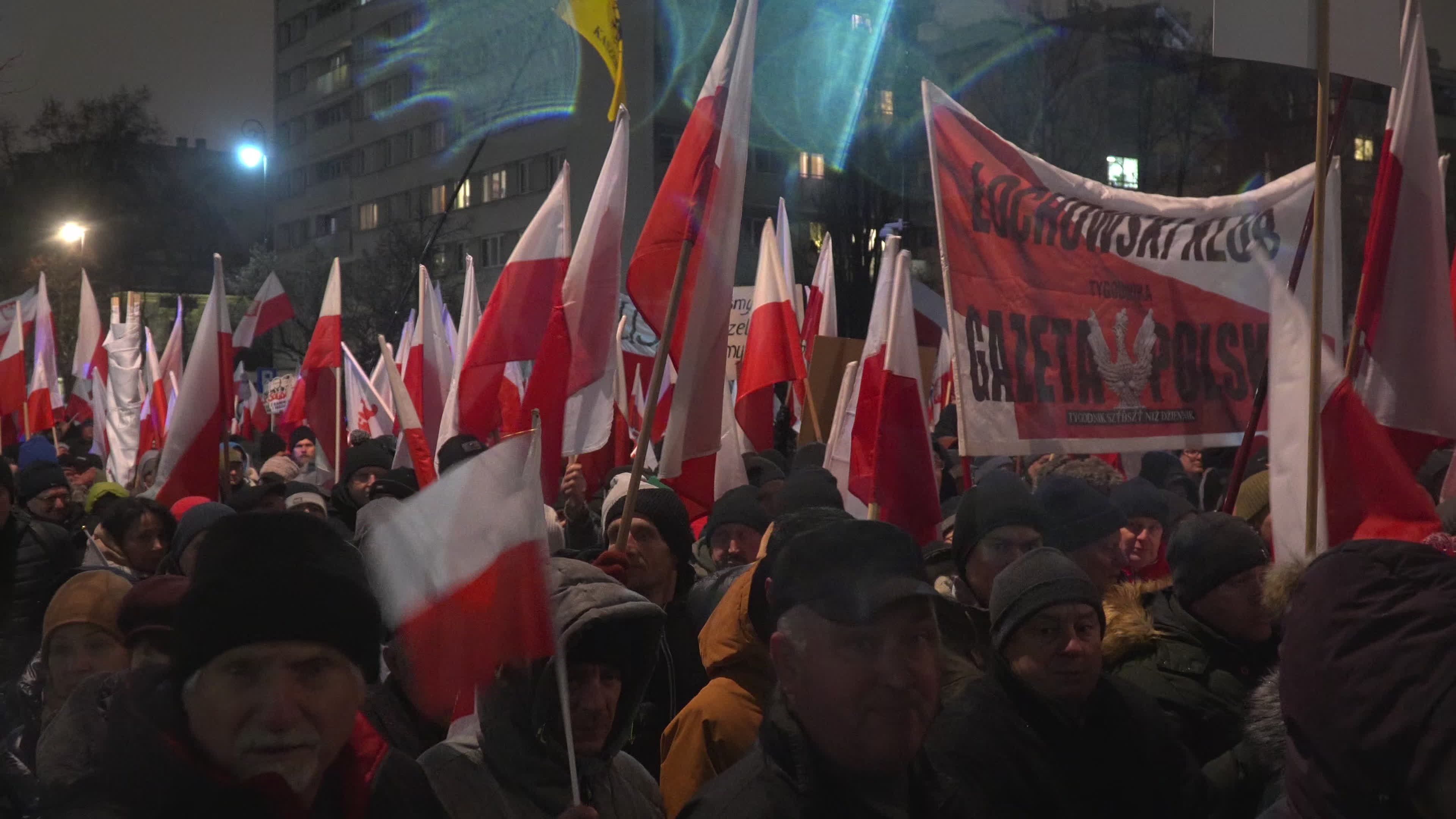 Tens of thousands march in protest of imprisoned politicians in Warsaw