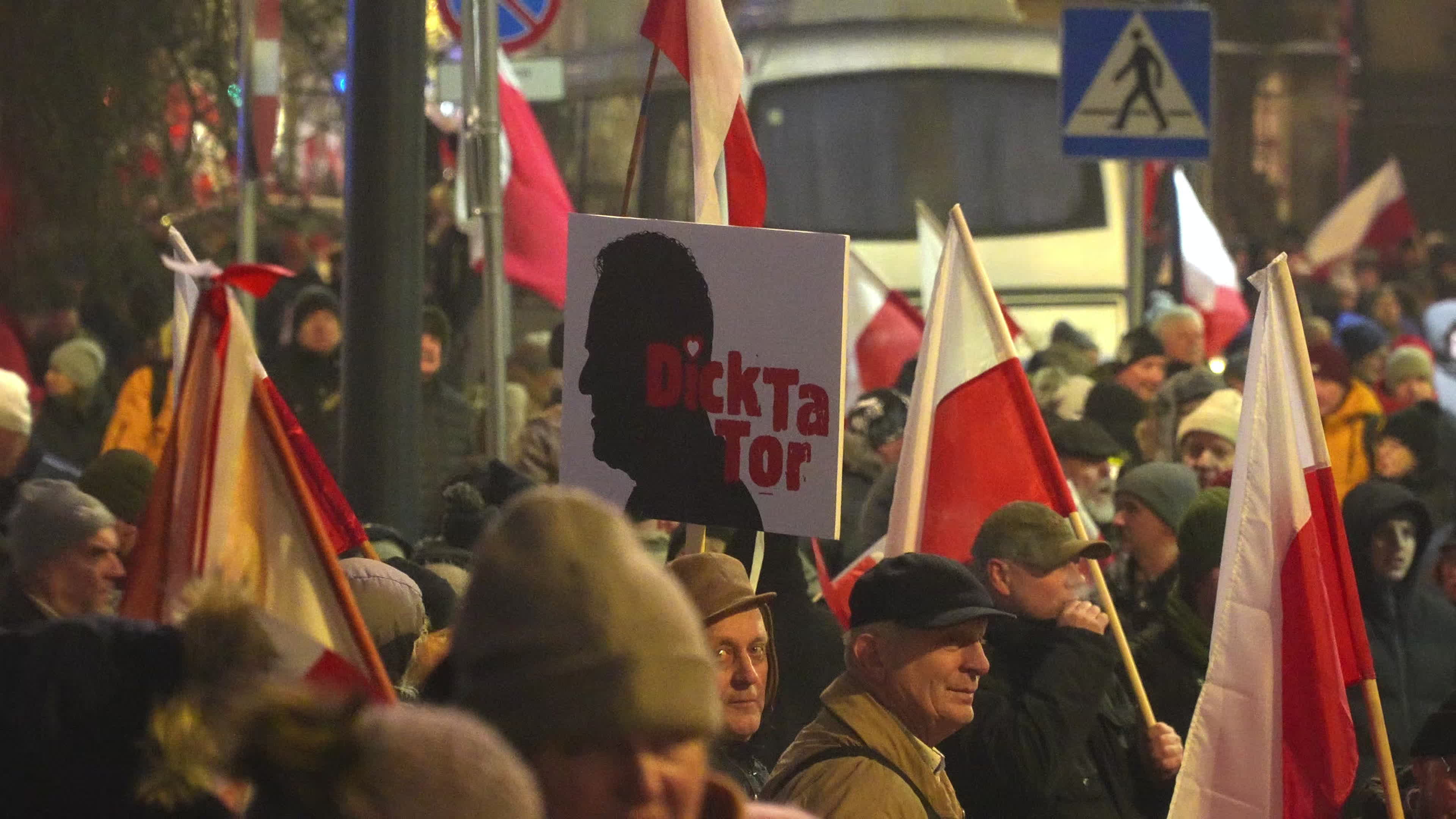 Tens of thousands march in protest of imprisoned politicians in Warsaw