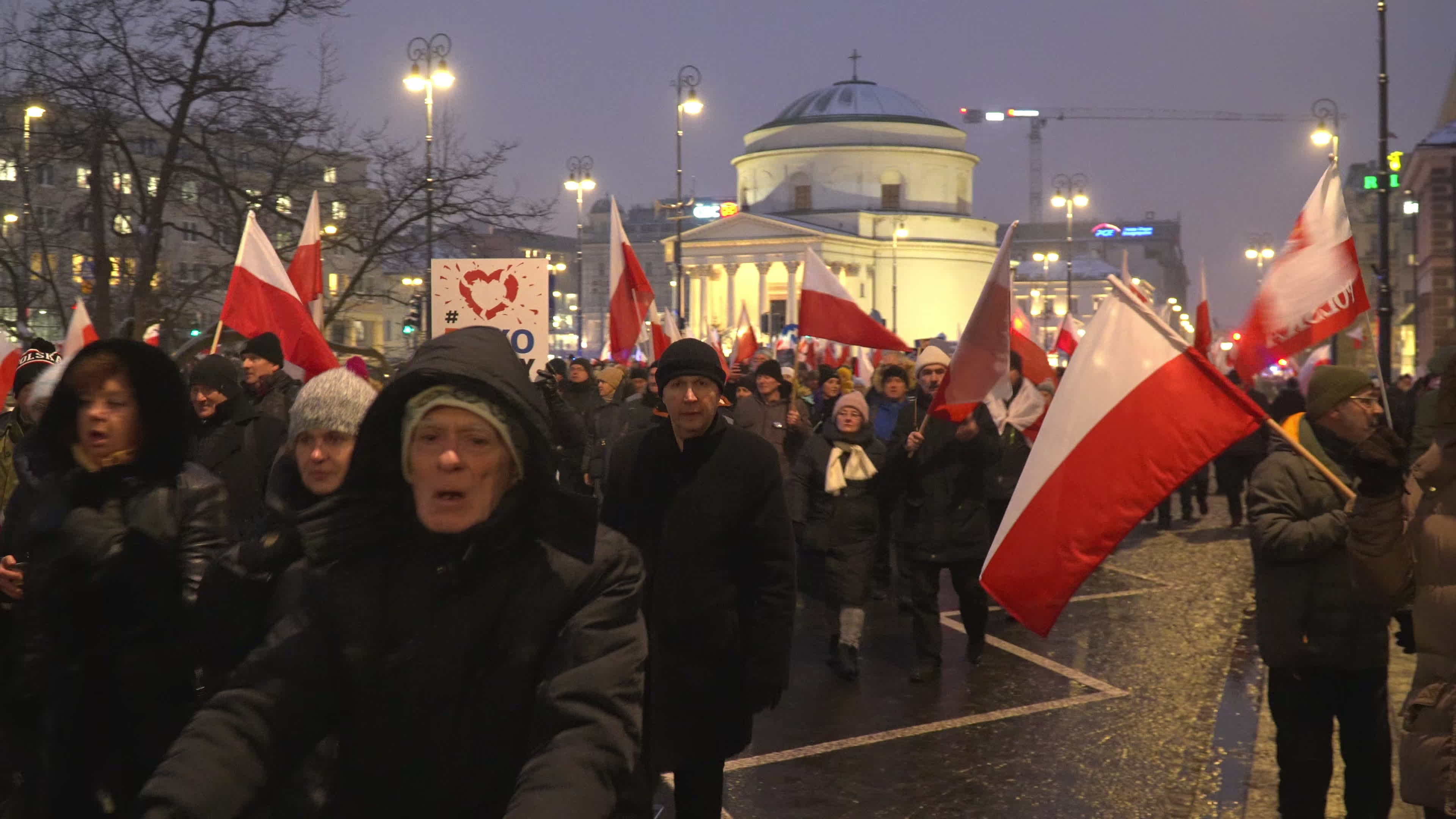 Tens of thousands march in protest of imprisoned politicians in Warsaw