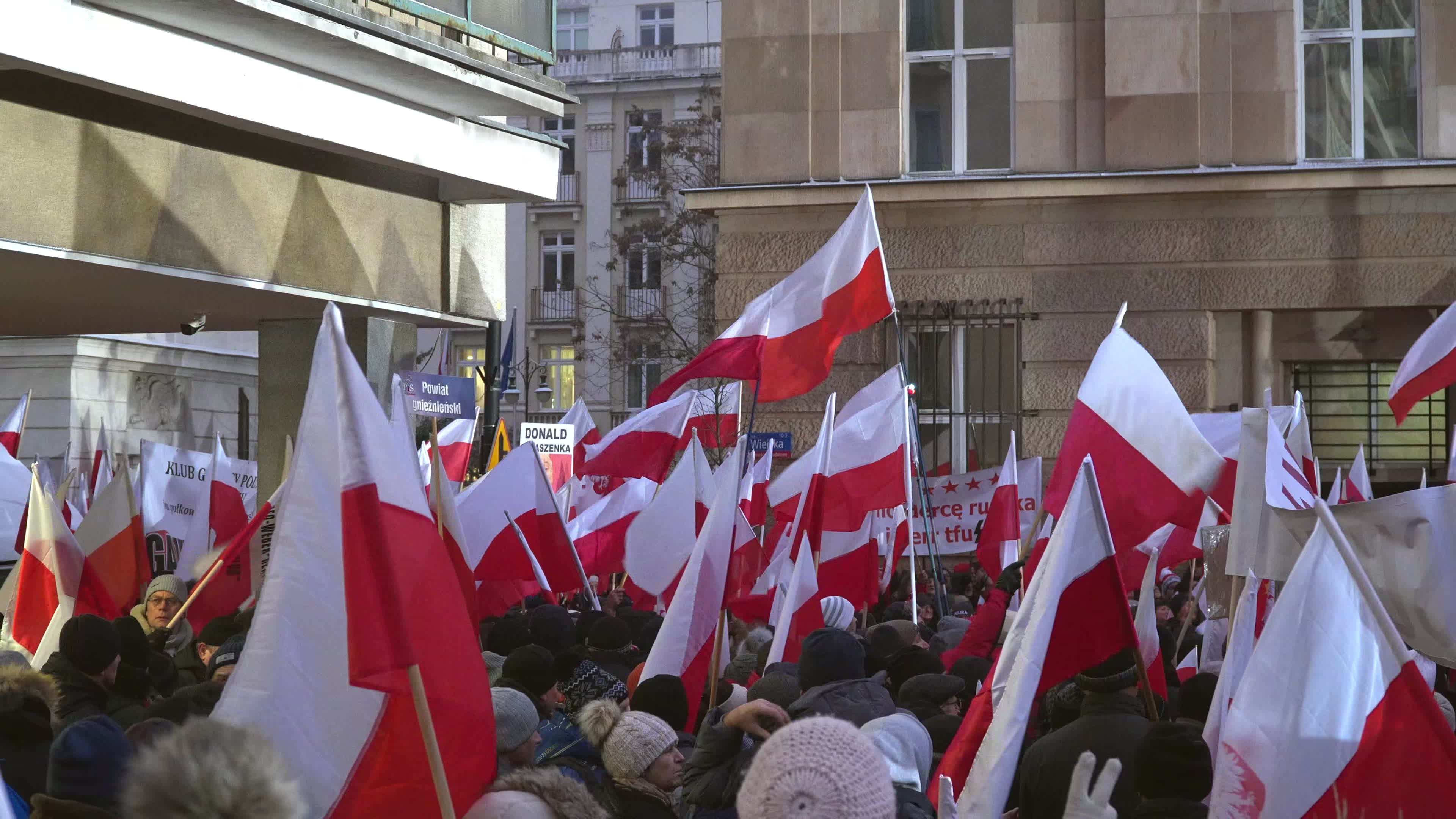 Tens of thousands march in protest of imprisoned politicians in Warsaw