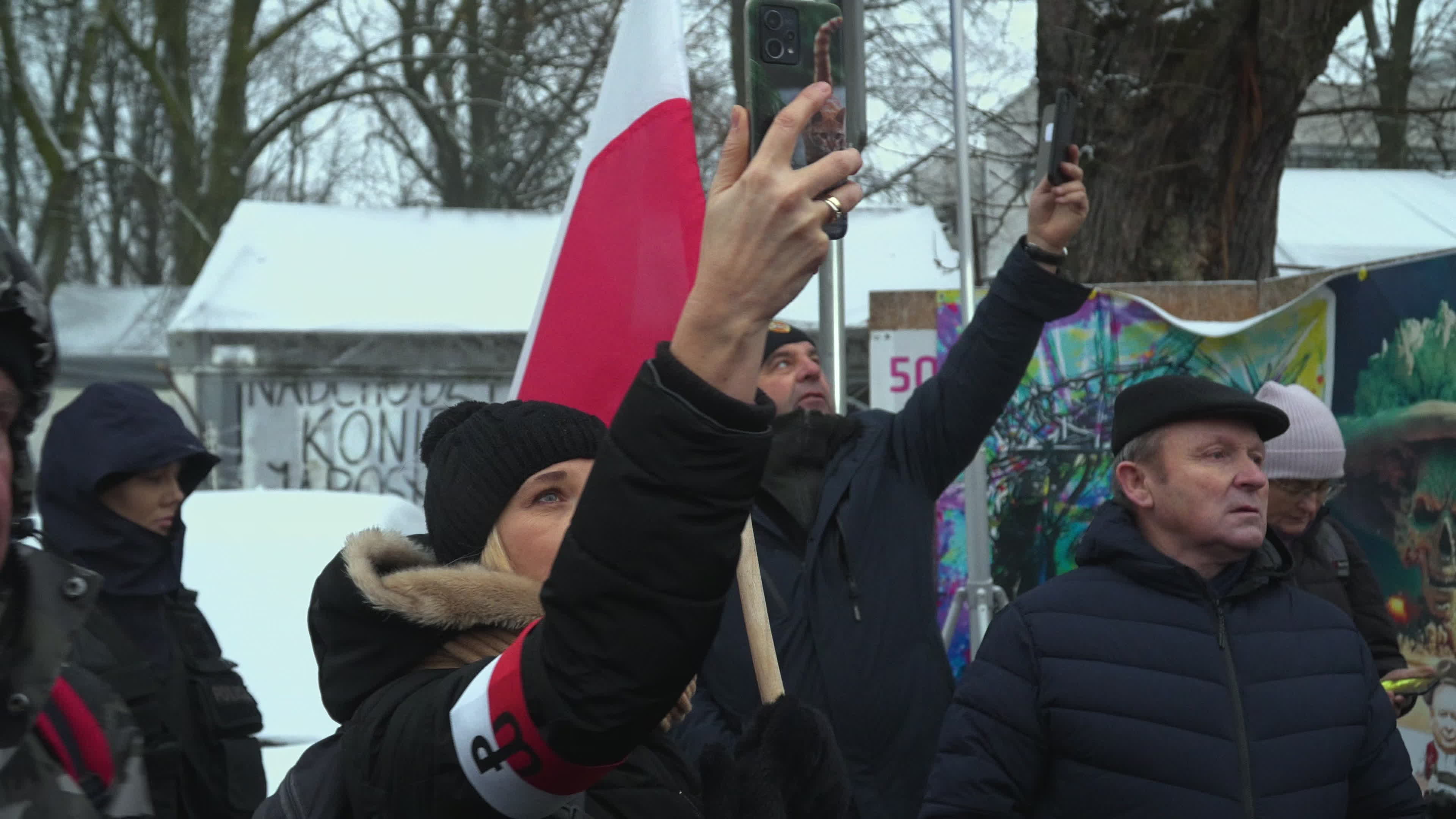 Tens of thousands march in protest of imprisoned politicians in Warsaw
