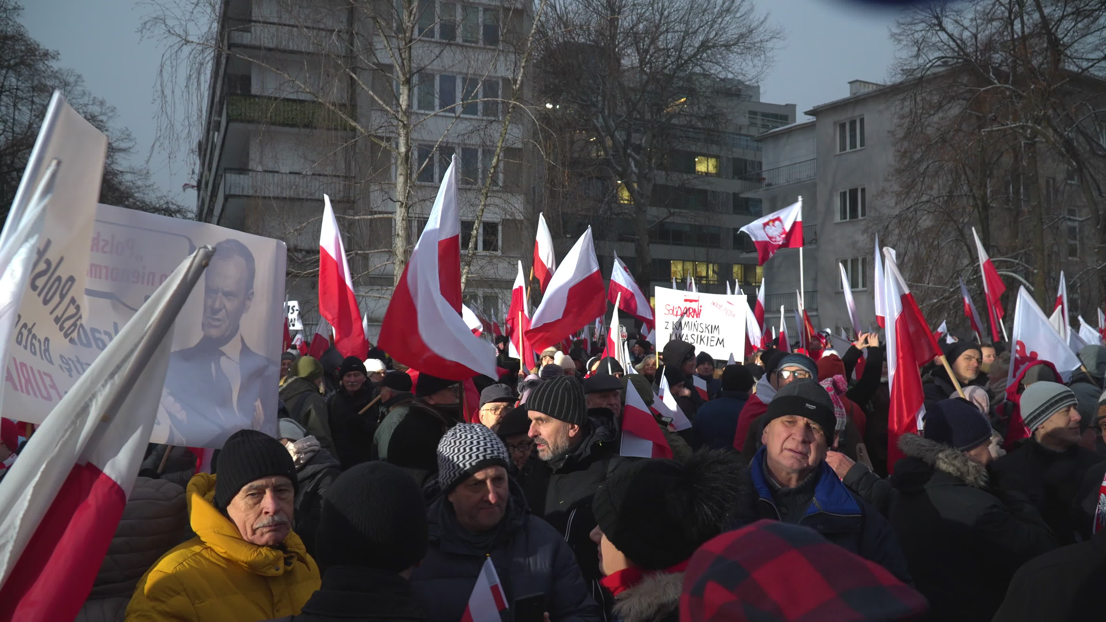 Tens of thousands march in protest of imprisoned politicians in Warsaw