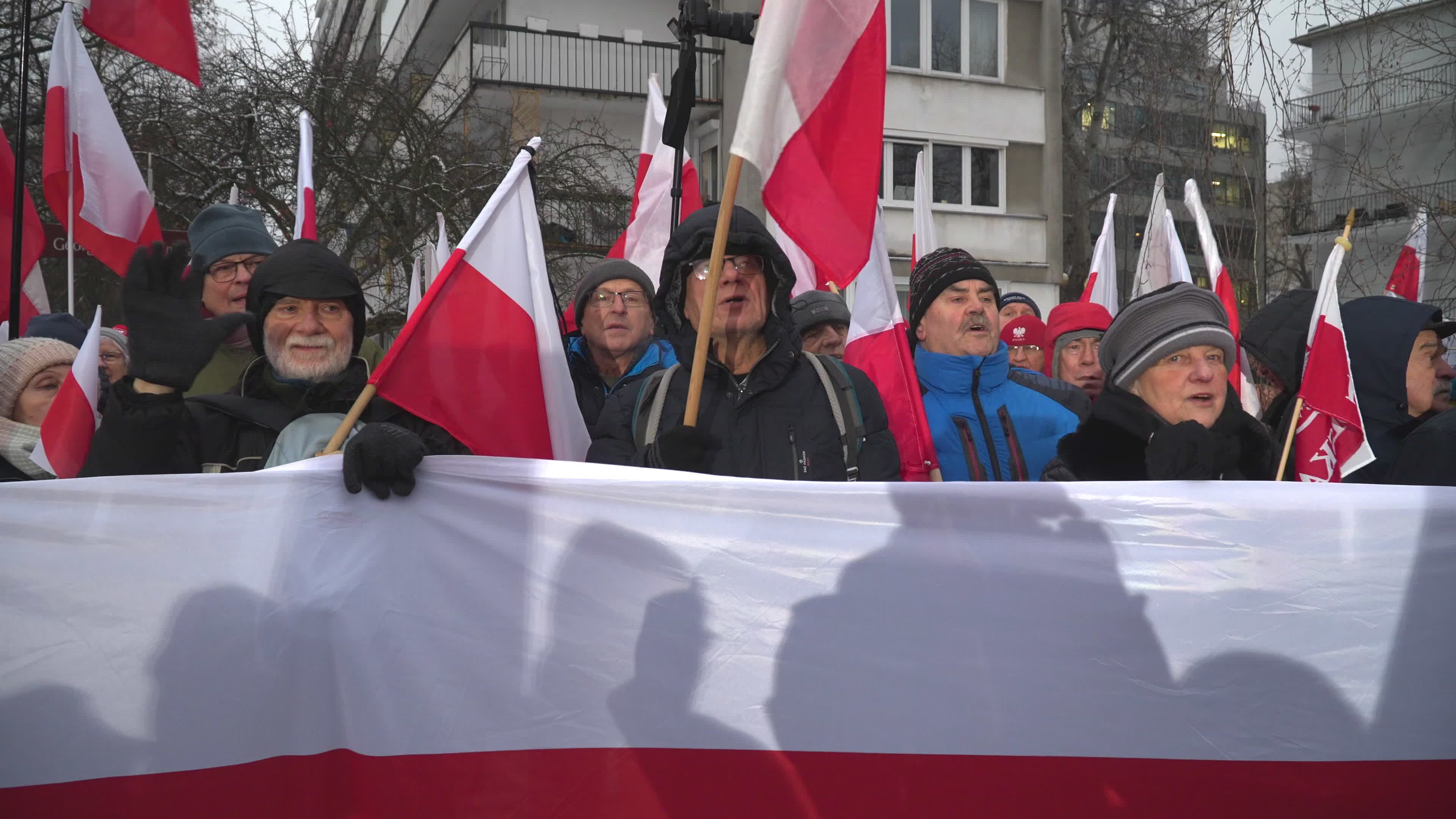Tens of thousands march in protest of imprisoned politicians in Warsaw