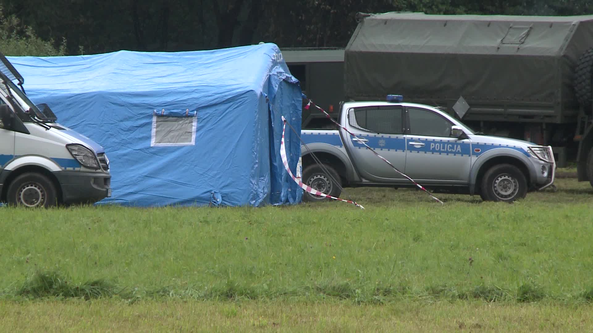 Migrants camp at Polish-Belarusian border guarded by police and military
