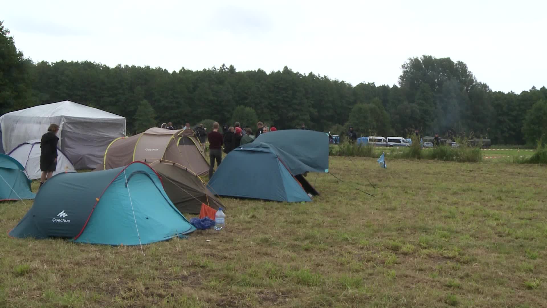 Migrants camp at Polish-Belarusian border guarded by police and military