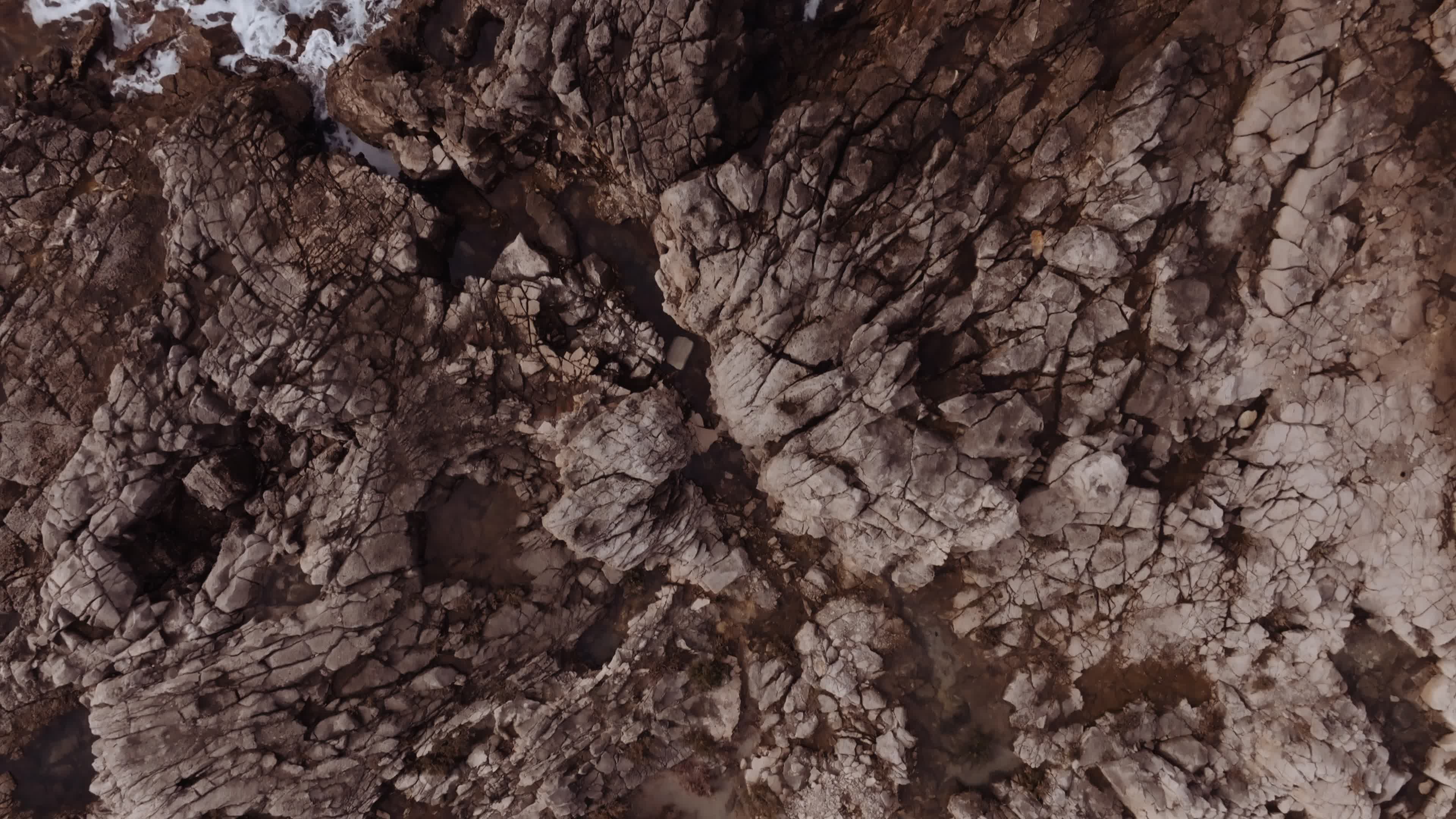 Drone View Of Cliff With Waves In The Ionic Coast