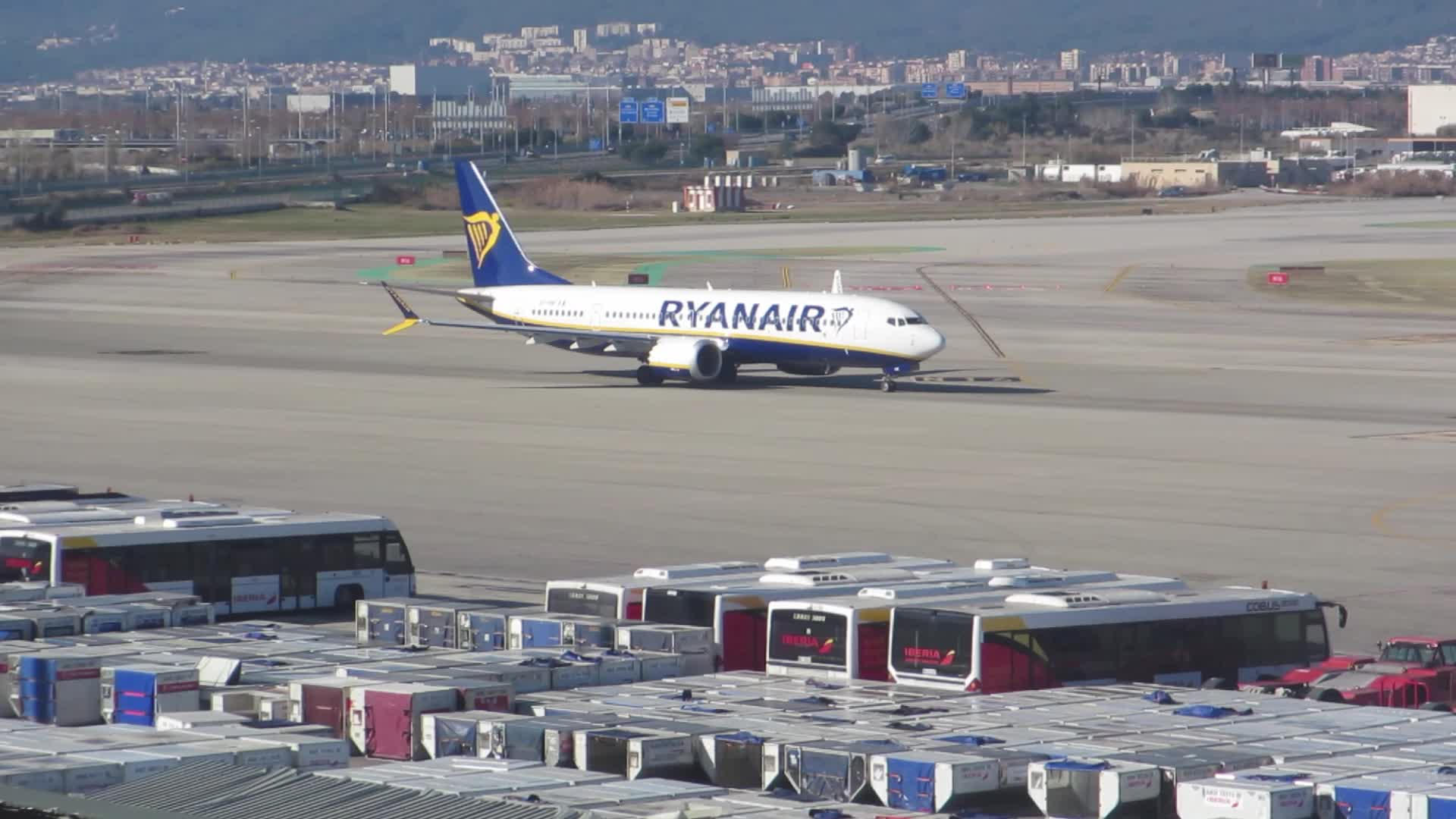 Diverse aircraft on the runway of Barcelona airport