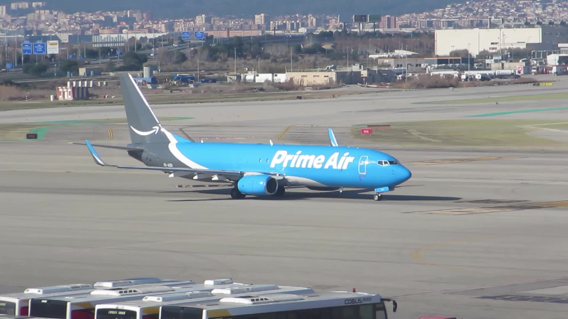 Diverse aircraft on the runway of Barcelona airport