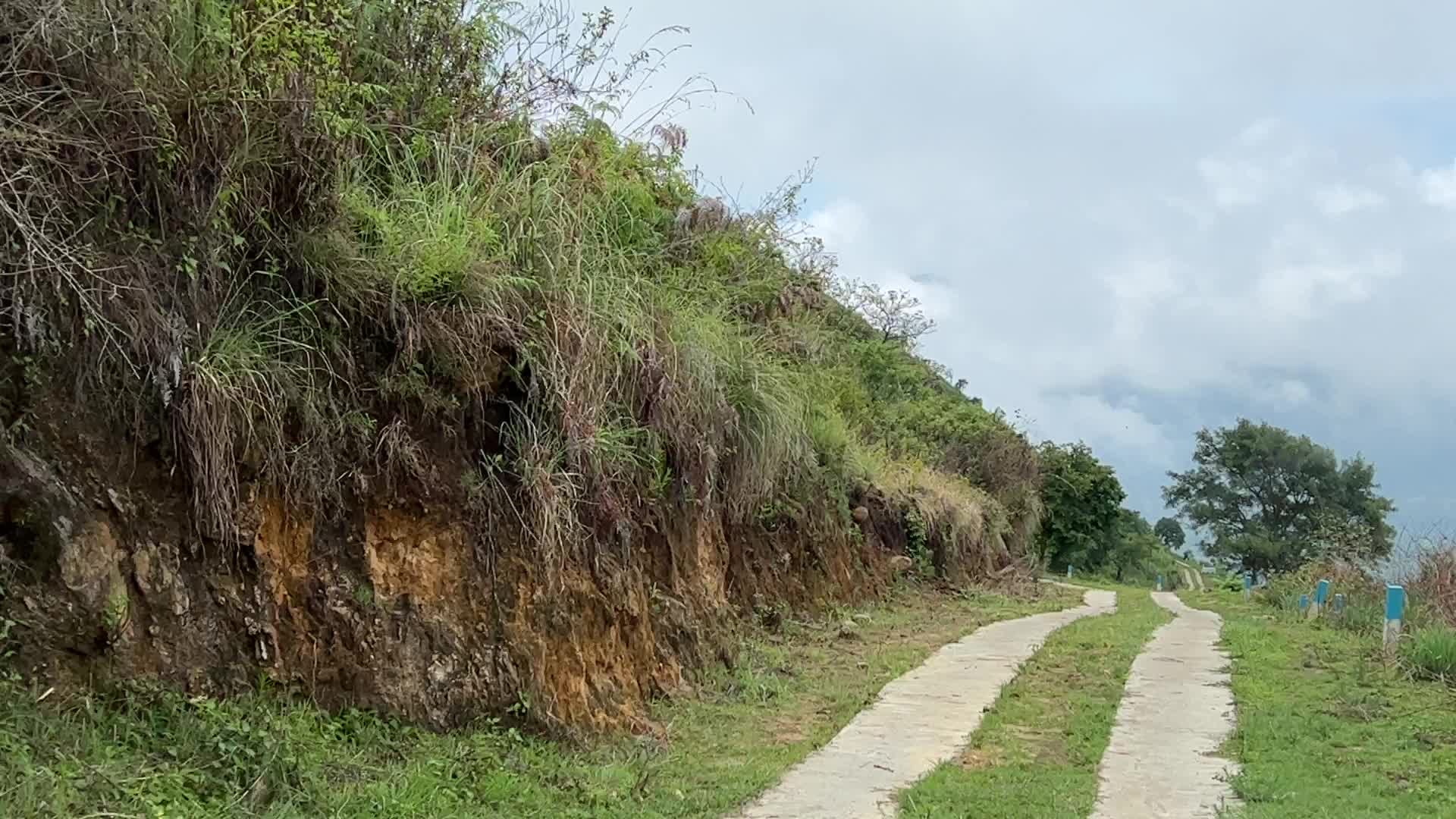 Mountain road cutting through the jungle in Dindigul,