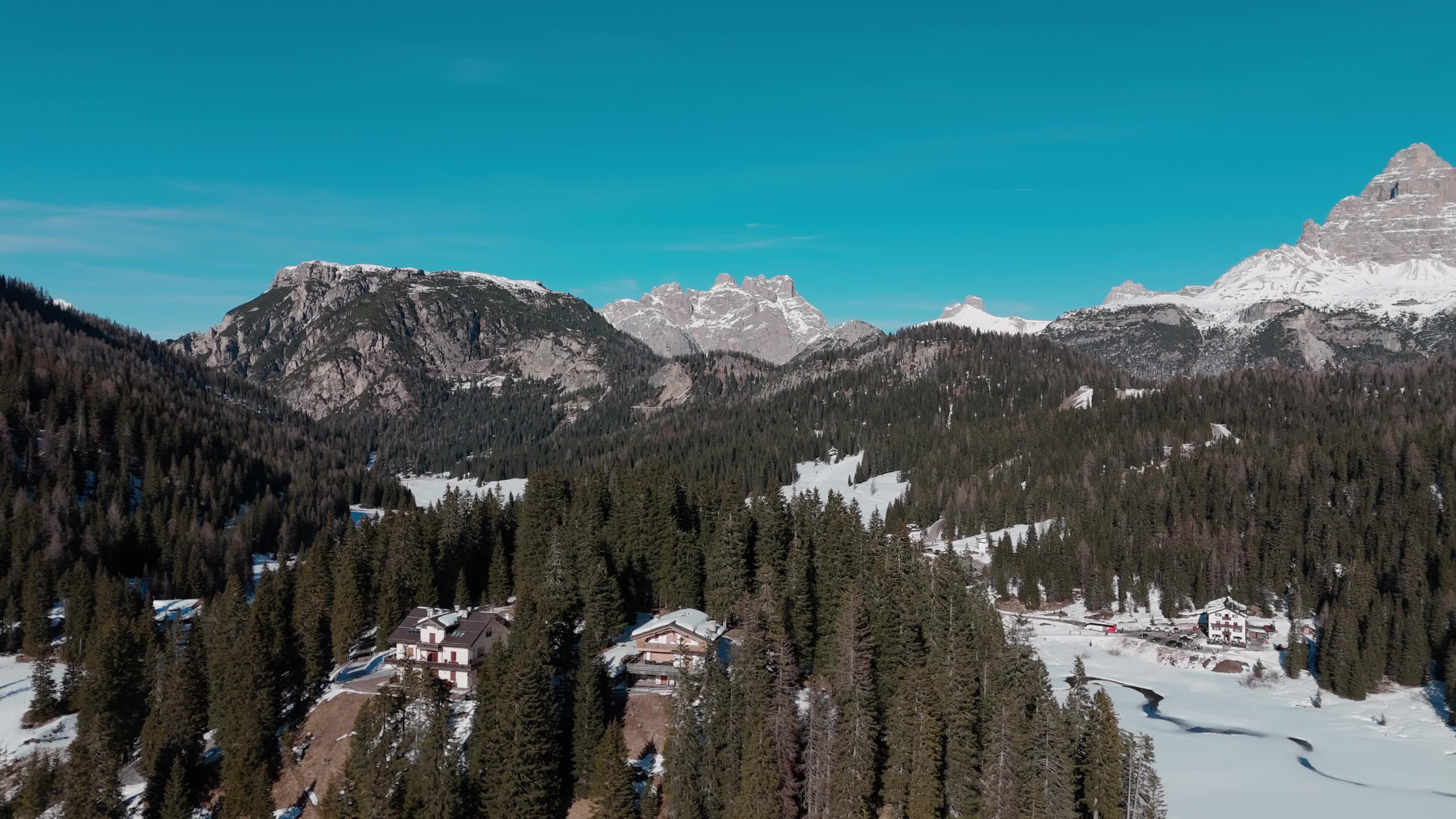 Drone View of Frozen Lake Misurina Covered in Snow