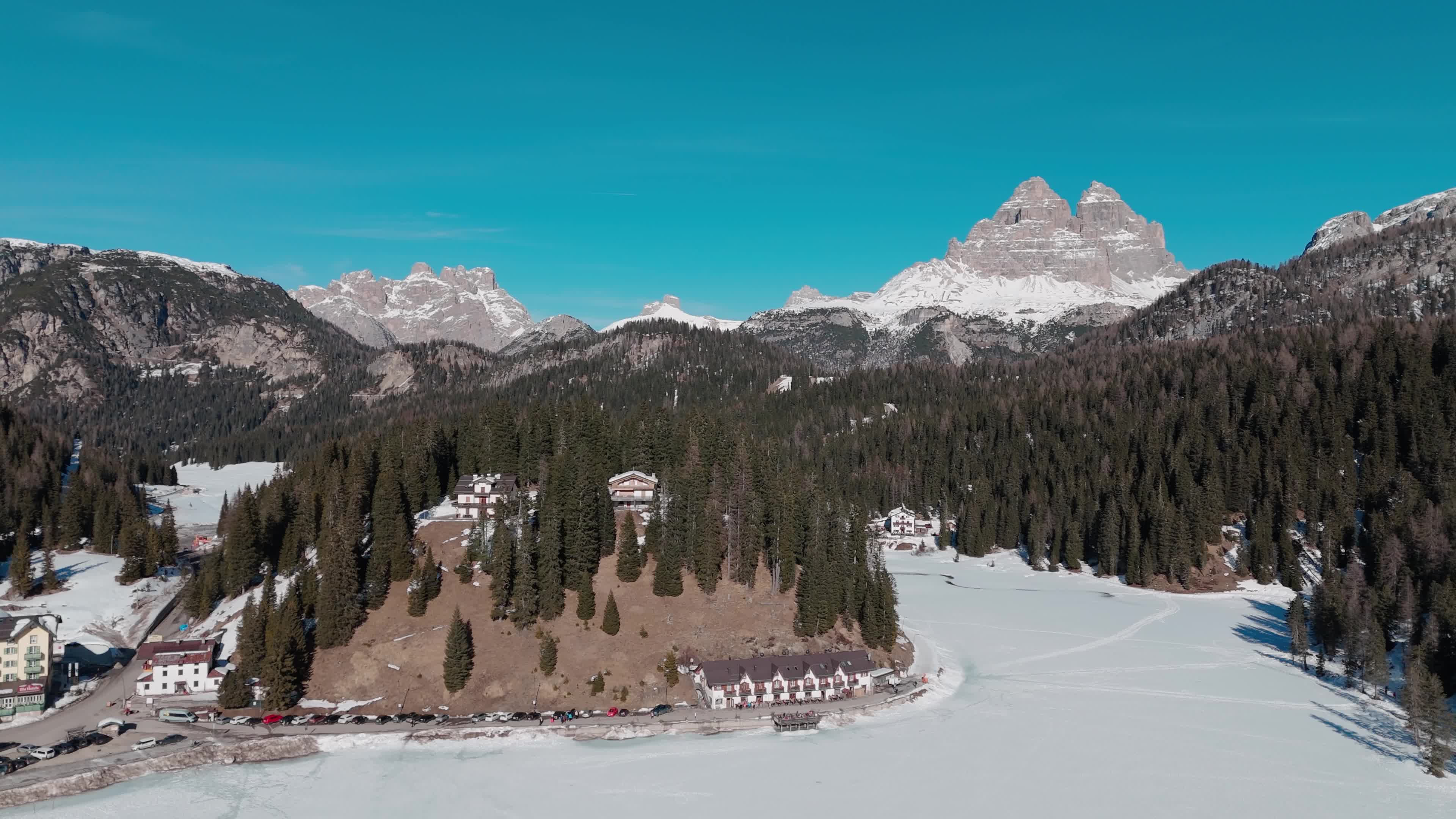Drone View of Frozen Lake Misurina Covered in Snow