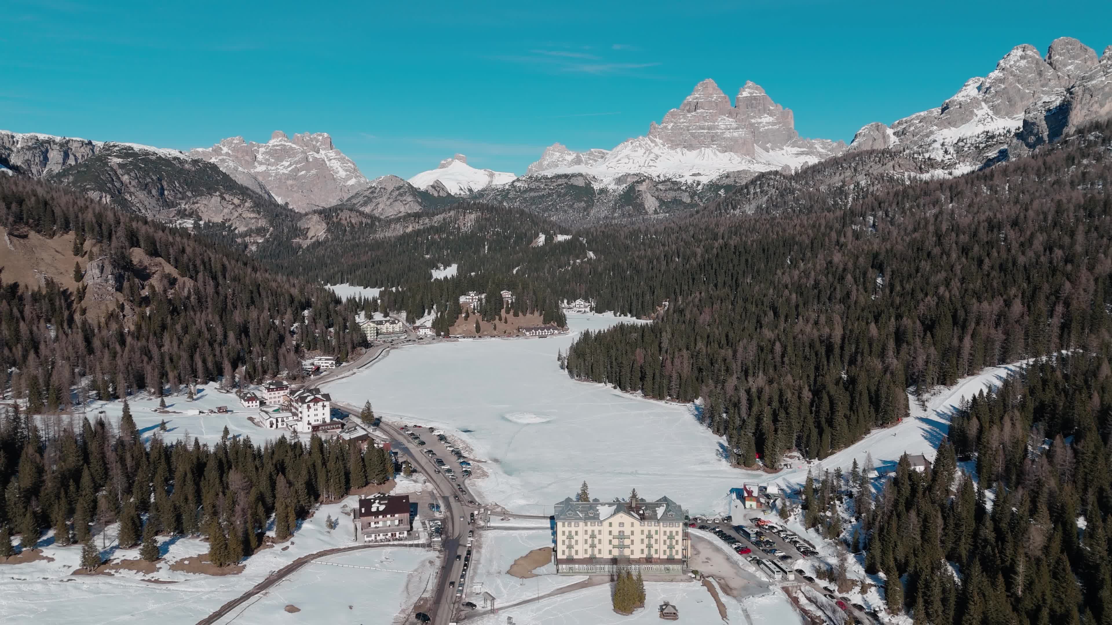 Drone View of Frozen Lake Misurina Covered in Snow
