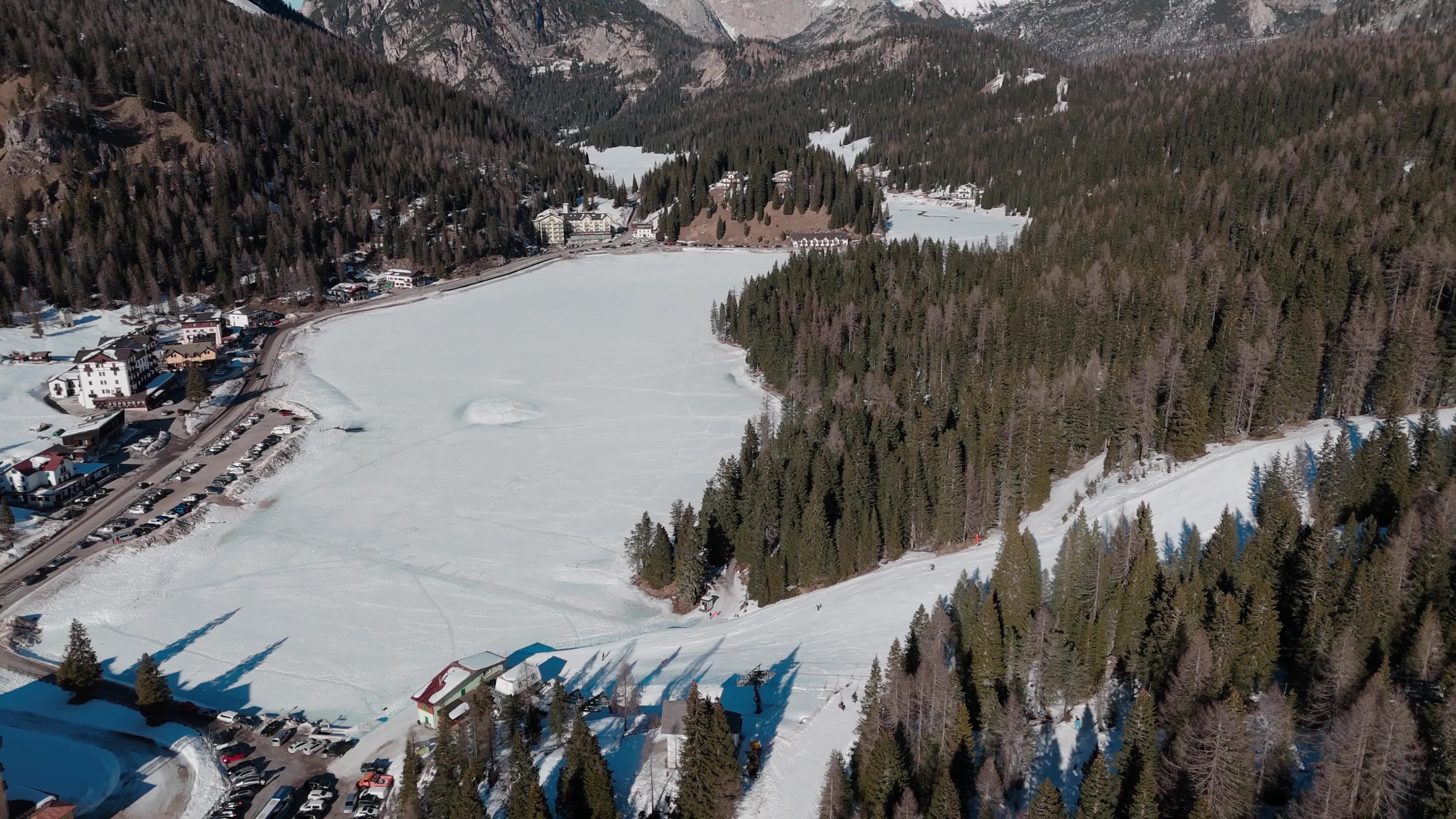 Drone View of Frozen Lake Misurina Covered in Snow