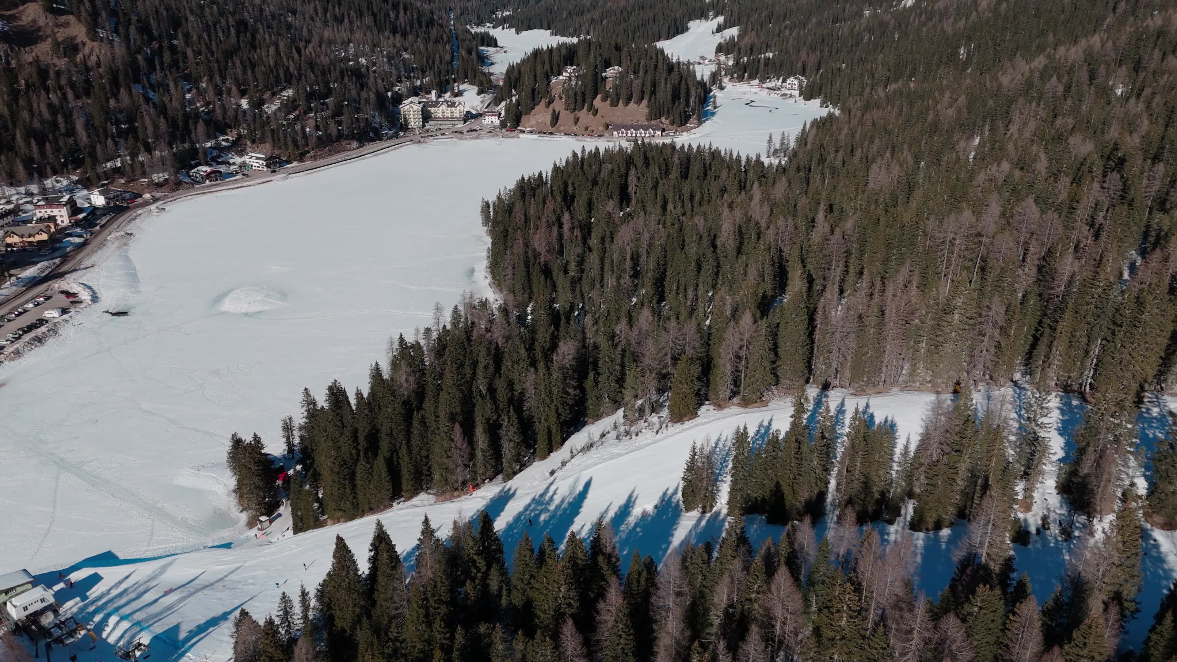 Drone View of Frozen Lake Misurina Covered in Snow