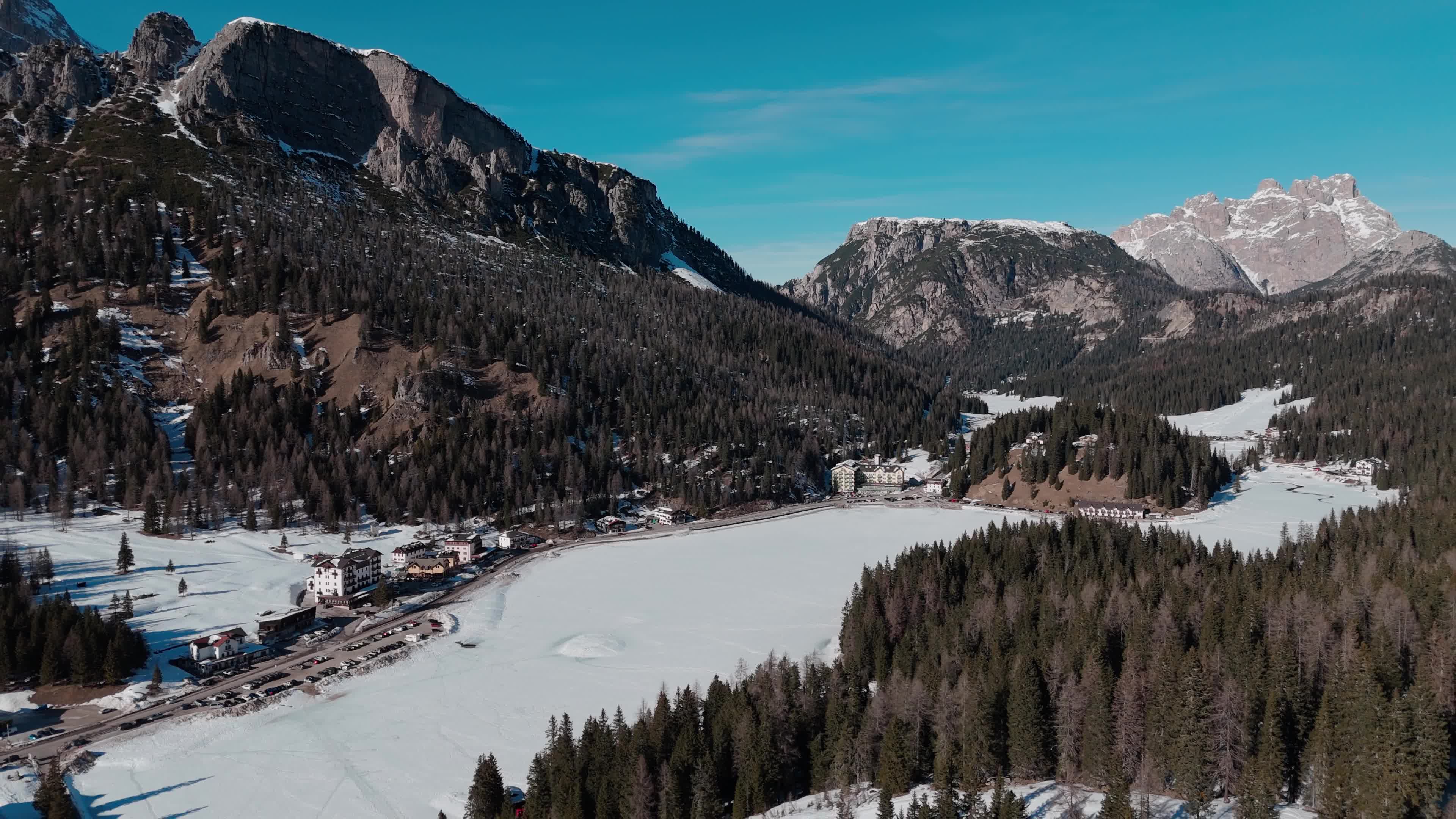 Drone View of Frozen Lake Misurina Covered in Snow
