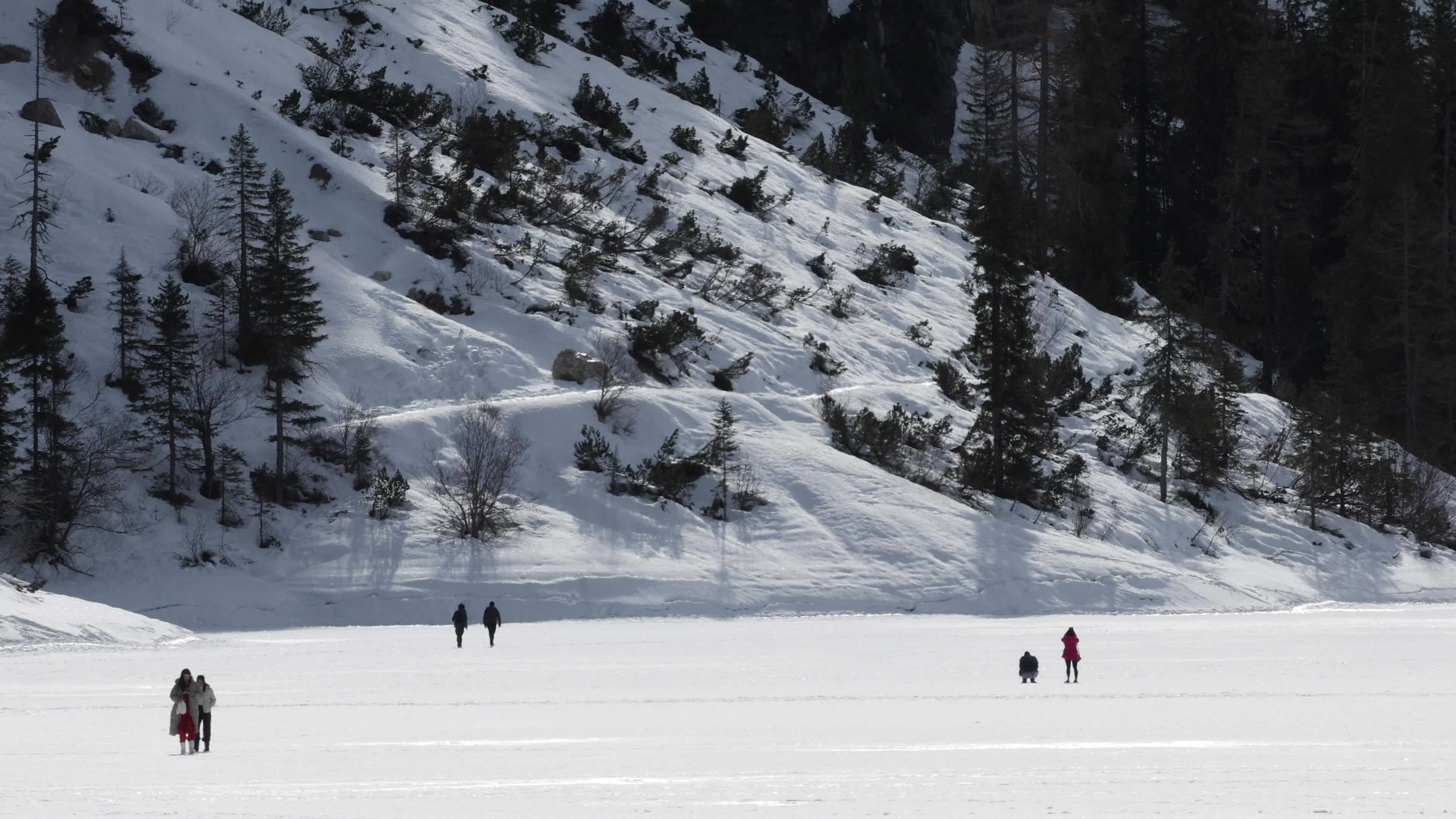Lake Braies: Thin Ice Alerts Amid Mild Italian Winter
