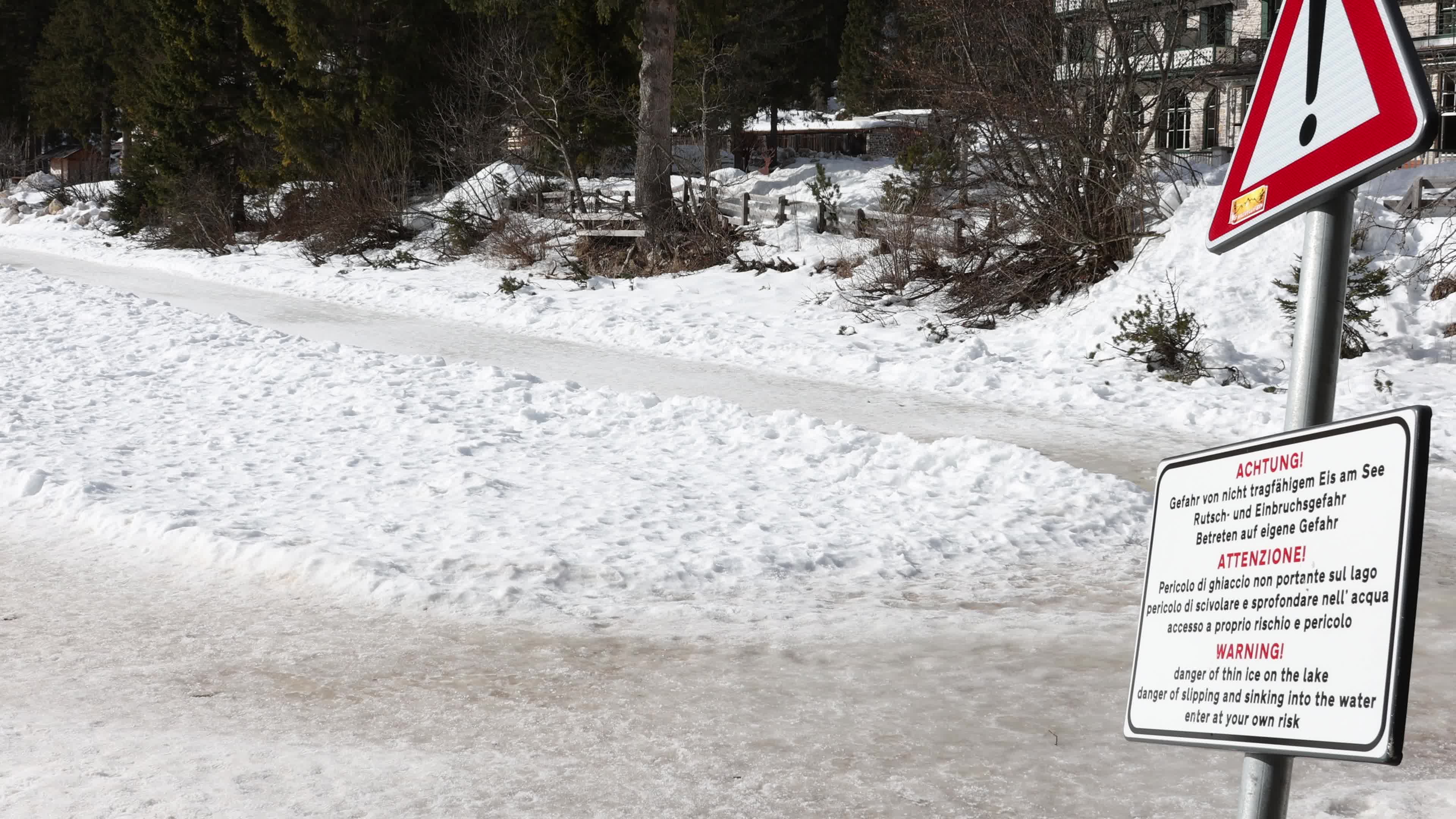 Lake Braies: Thin Ice Alerts Amid Mild Italian Winter